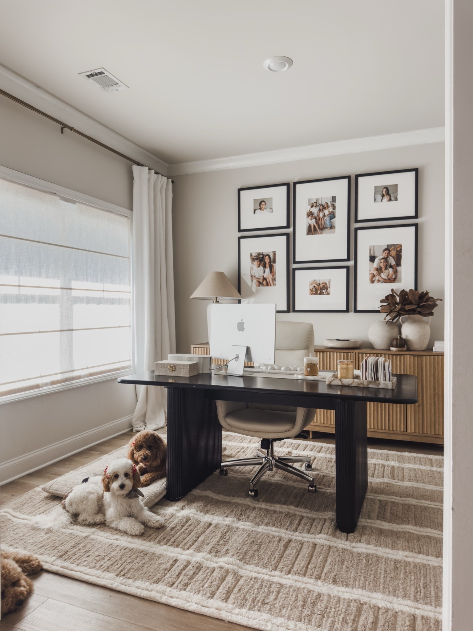 Sharing some details in my office with a subtle touch of fall decor!

My storage cabinets have been so great for holding all of the random things I need tucked away and out of sight.

I couldn’t find an actual desk that I liked, so I opted for a dining table instead. I have so much room, and I love how it looks in the space.

My new rug from @Rugs USA is officially my new favorite. It’s so cozy, and I’m loving the subtle striped detail. It adds just the right amount of warmth to the space.

A closer glimpse at my all time favorite curtains. I have these throughout my entire home! They’re an Italian faux linen in “Magnolia Off White,” but they aren’t really off-white at all. They’re the prettiest warm, neutral shade.

Also sharing a close up of how I contain all of the wire mess and keep everything looking a little more organized! #gifted