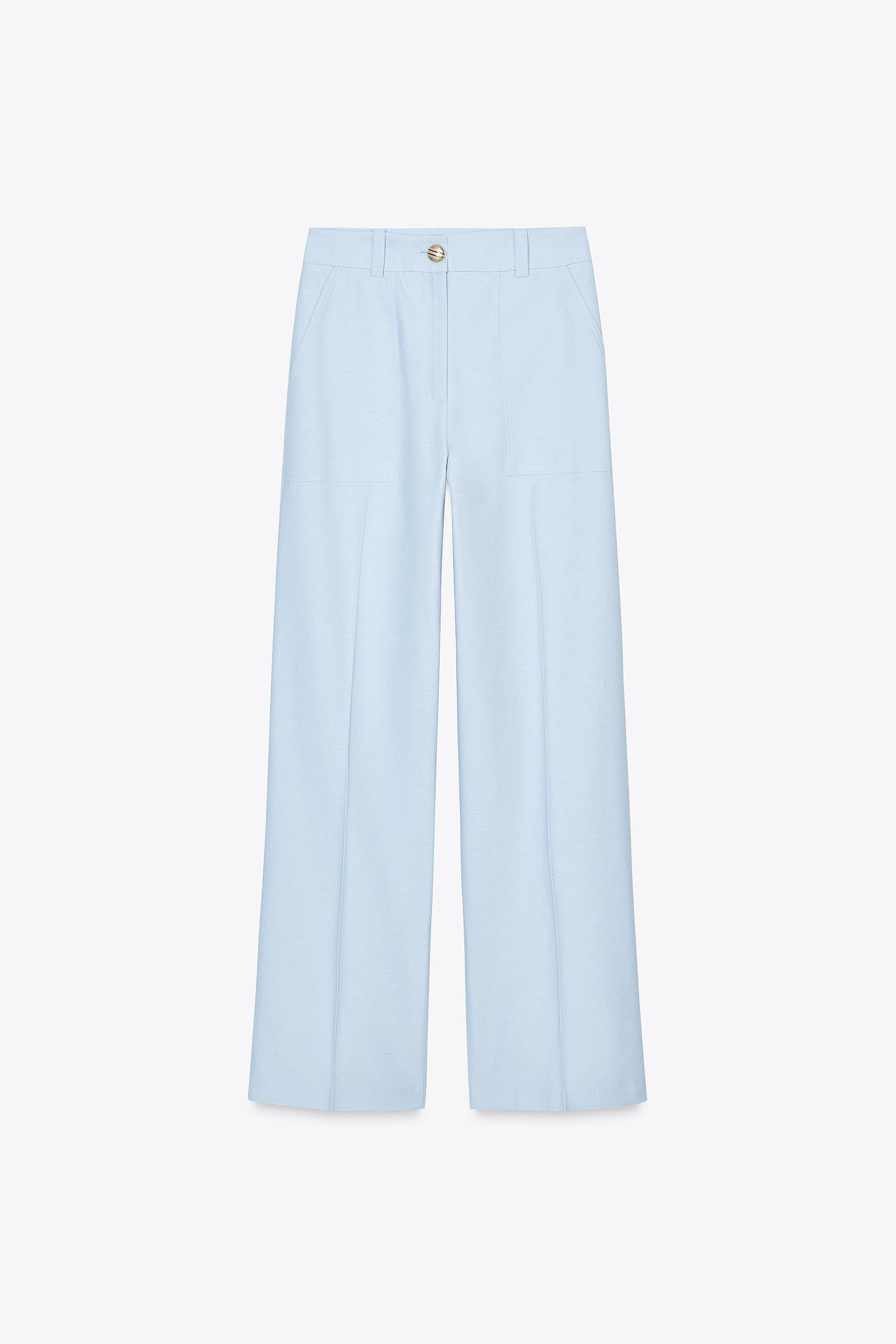High-waisted pants with front pockets and back false flap pockets with button. Straight leg. Fron... | Zara US