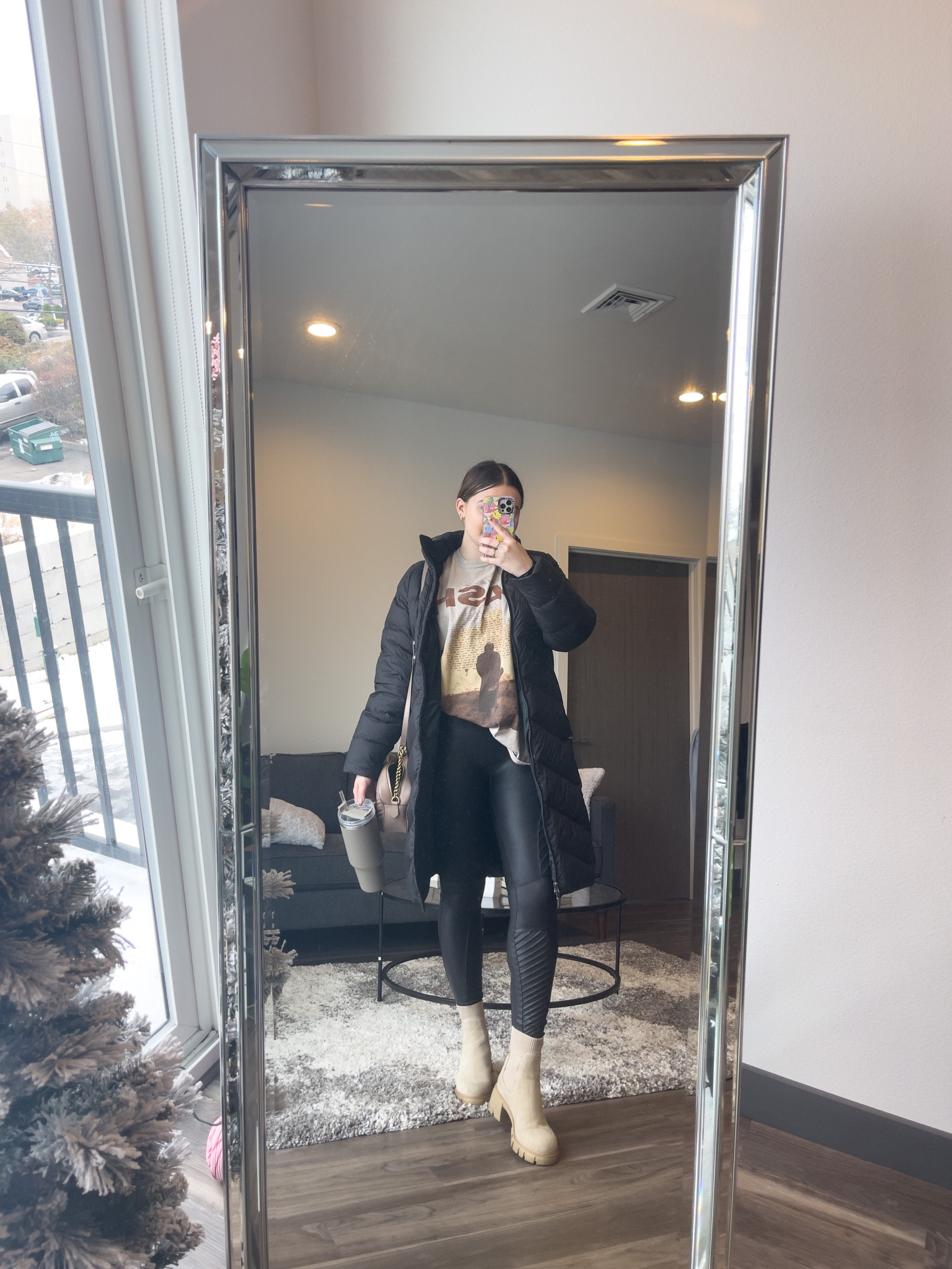 Casual yet warm fall outfit idea! Featuring leather leggings and an oversized graphic tee 

I’m wearing a L/XL tee, L coat, size M leggings and size 9 boots 

#LTKSeasonal #LTKstyletip #LTKunder100