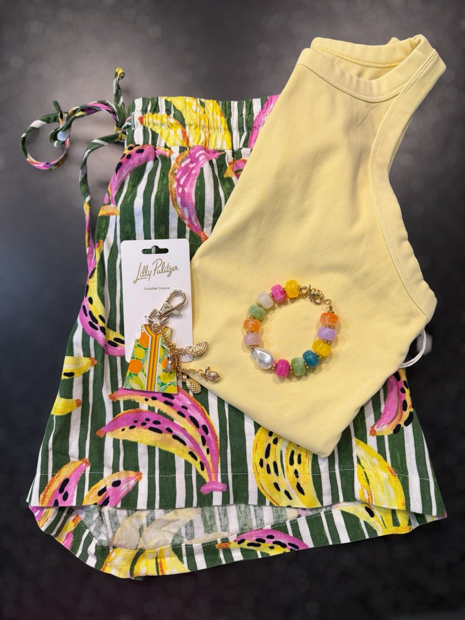 Sunny Citrus Summer Set 🍋☀️

This cheerful summer combo is giving all the bright, happy vibes! 💛 The buttery yellow ribbed tank pairs perfectly with these fun tropical print shorts, while the colorful beaded bracelet adds the sweetest pop of color. I finished the look with the cutest Lilly-inspired shift dress charm that’s perfect for dressing up your tote, keys, or beach bag. 🌴✨

Easy, playful, and budget-friendly for everything from vacation days to weekend errands and casual summer outings.

Summer outfit inspiration, tropical print shorts, yellow tank outfit, colorful accessories, vacation style, resort wear, beach vacation outfit, citrus-inspired fashion, colorful summer look, affordable summer fashion, preppy summer style, bright outfit ideas, warm weather wardrobe, casual vacation outfit, tropical summer trends. 🍍🌺💛

#LTKOver40 #LTKSeasonal #LTKmomlife