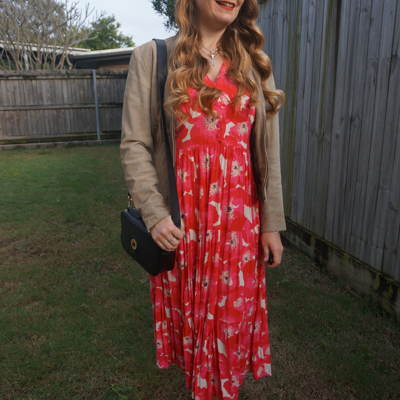 Vintage thrifted leather jacket, Orange Sherbet tiered floral maxi dress and Mimco Mim-mazing crossbody bag ❤️🖤

#LTKaustralia #LTKwinter #LTKbag