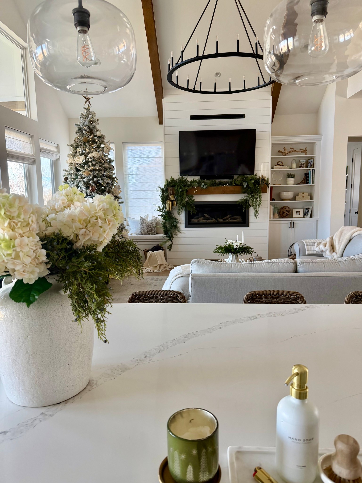 An organic modern home dressed for the holidays 🤍
Warm wood beams, a statement black chandelier, soft neutral seating, and layered greenery create a space that feels cozy, elevated, and timeless. I love how the kitchen island styling flows seamlessly into the living room for a cohesive, designer look.
Tap to shop the lighting, holiday greenery, decor, kitchen accessories, and living room finds to recreate this cozy holiday home style.

#LTKHome #LTKHoliday #LTKLivingRoom #HolidayHomeDecor #OrganicModernHome #NeutralHolidayDecor #ModernFarmhouseStyle #HomeDecorInspo #LTKFinds #LTKSaleAlert
