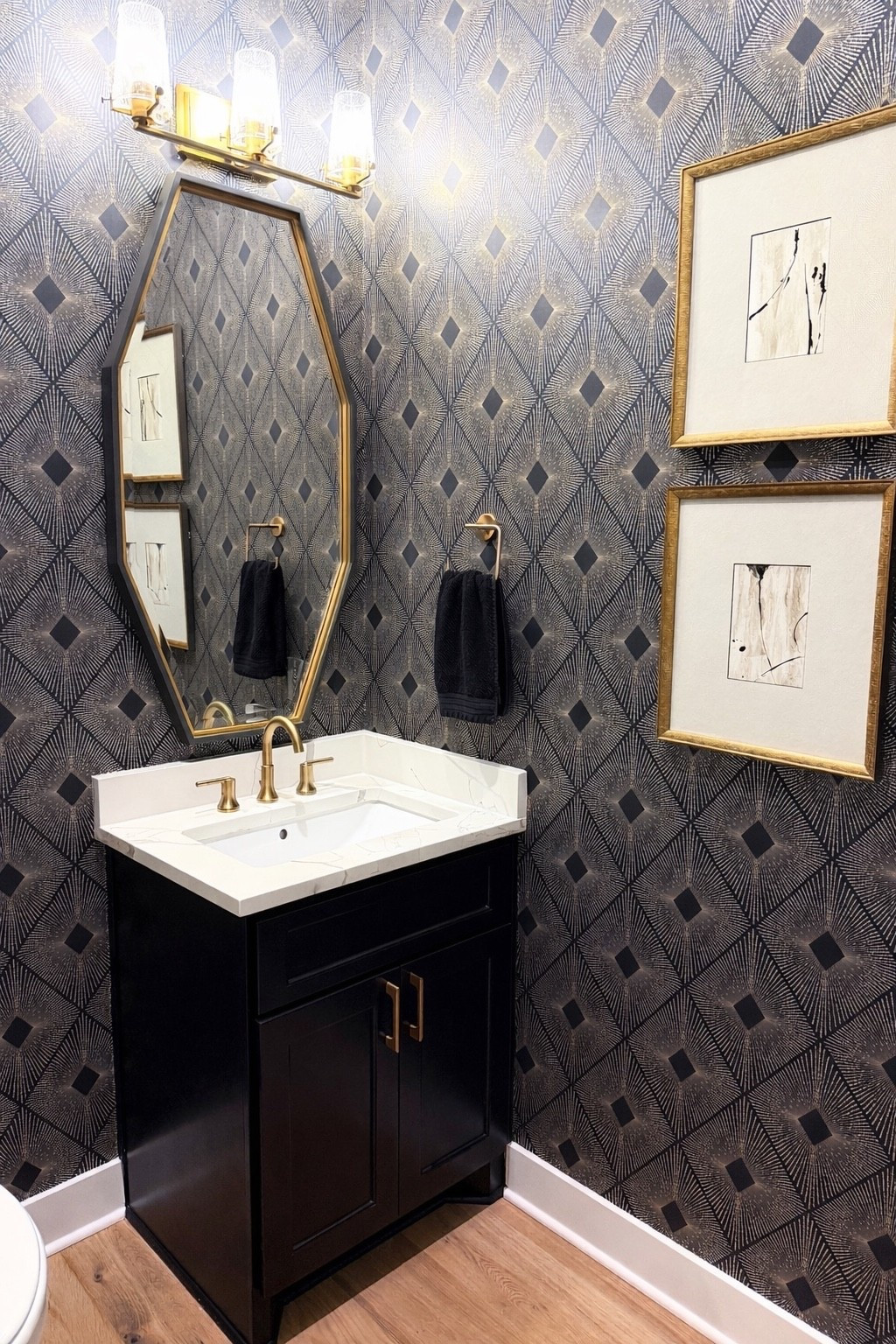 #powderbathroom #wallpaper #bolddesign #blackandwhitebathroom 

#LTKHome