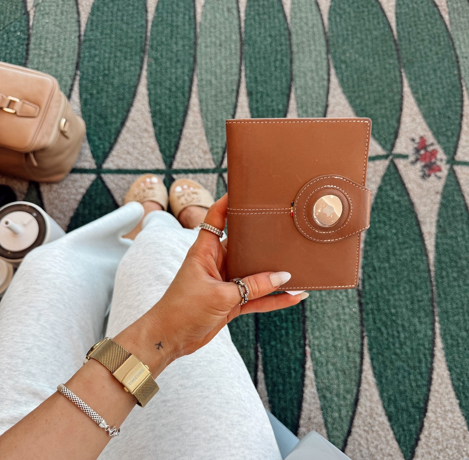Travel Fav 🤎🧳 I have an AirTag on all my travel stuff but this passport holder is so cute! 

#LTKGiftGuide #LTKFindsUnder50 #LTKTravel