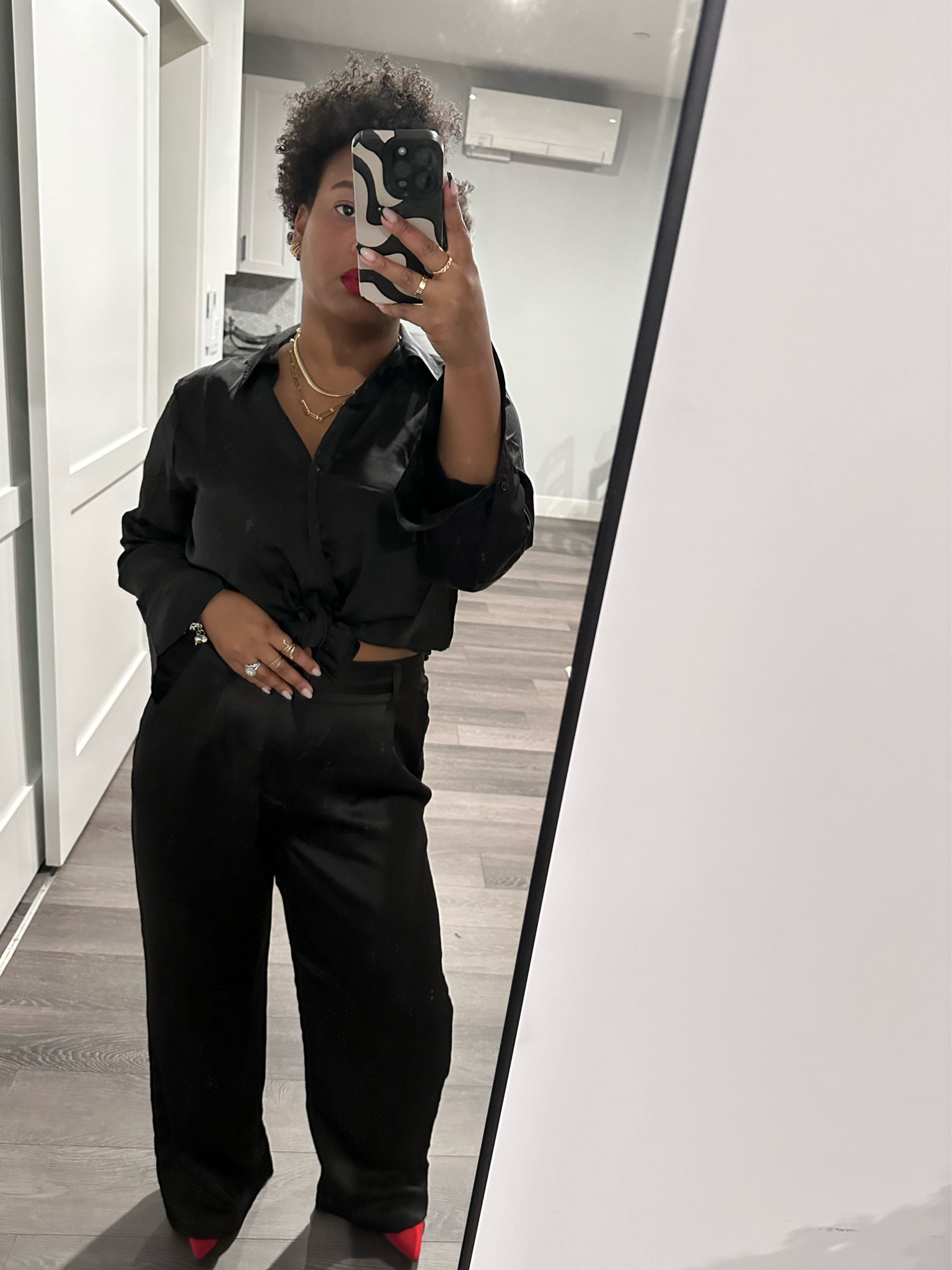 I love this all black vibe for a night out with details of red and gold.

Both clothing pieces are from H&M in size M both TTS.

I you want a baggy look I suggest sizing up. 

#LTKstyletip #LTKbeauty #LTKfindsunder50