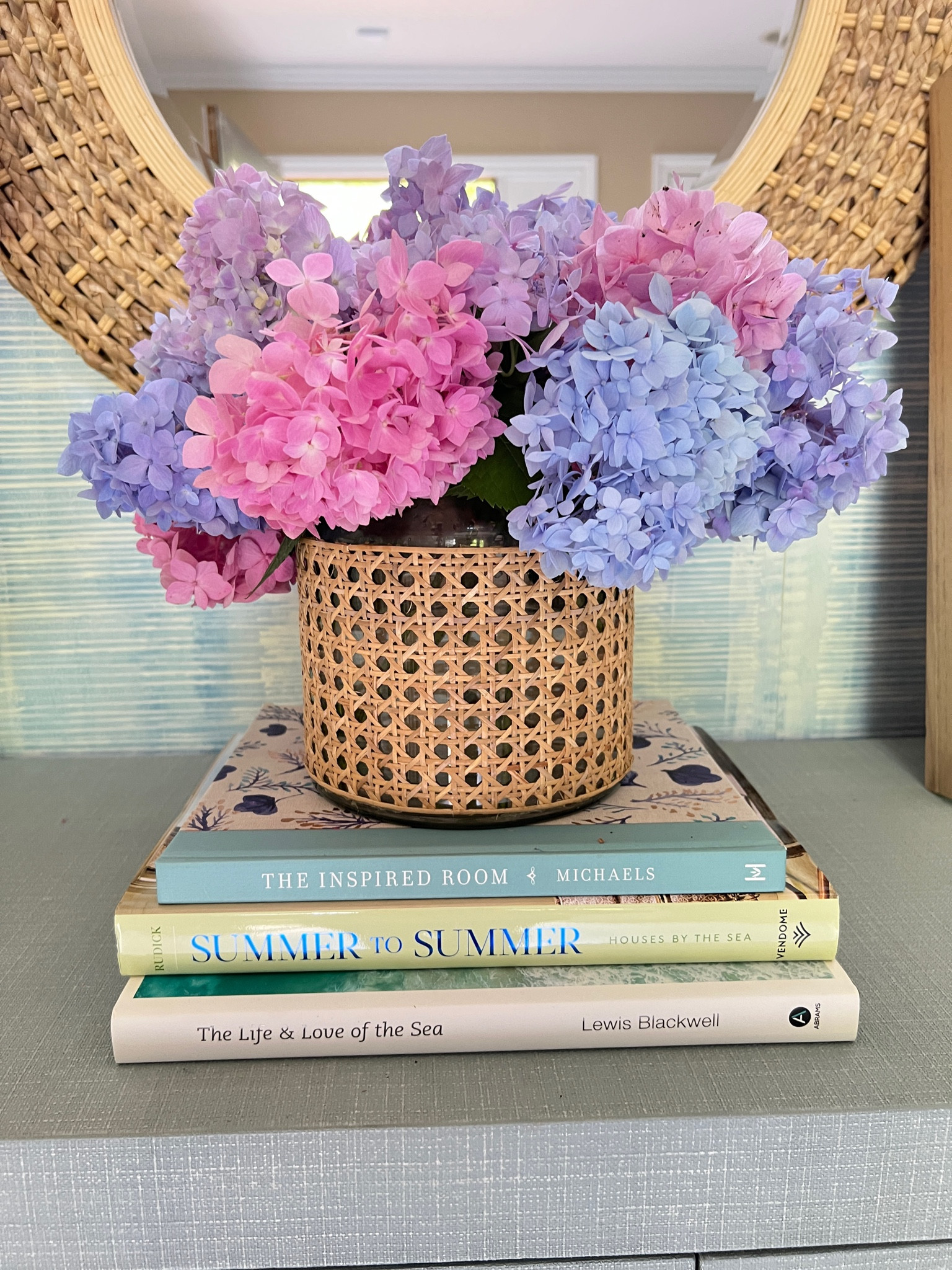 Coastal home decor, coastal decor, cane wrapped vase, coffee table books



#LTKhome #LTKfindsunder100 #LTKsalealert