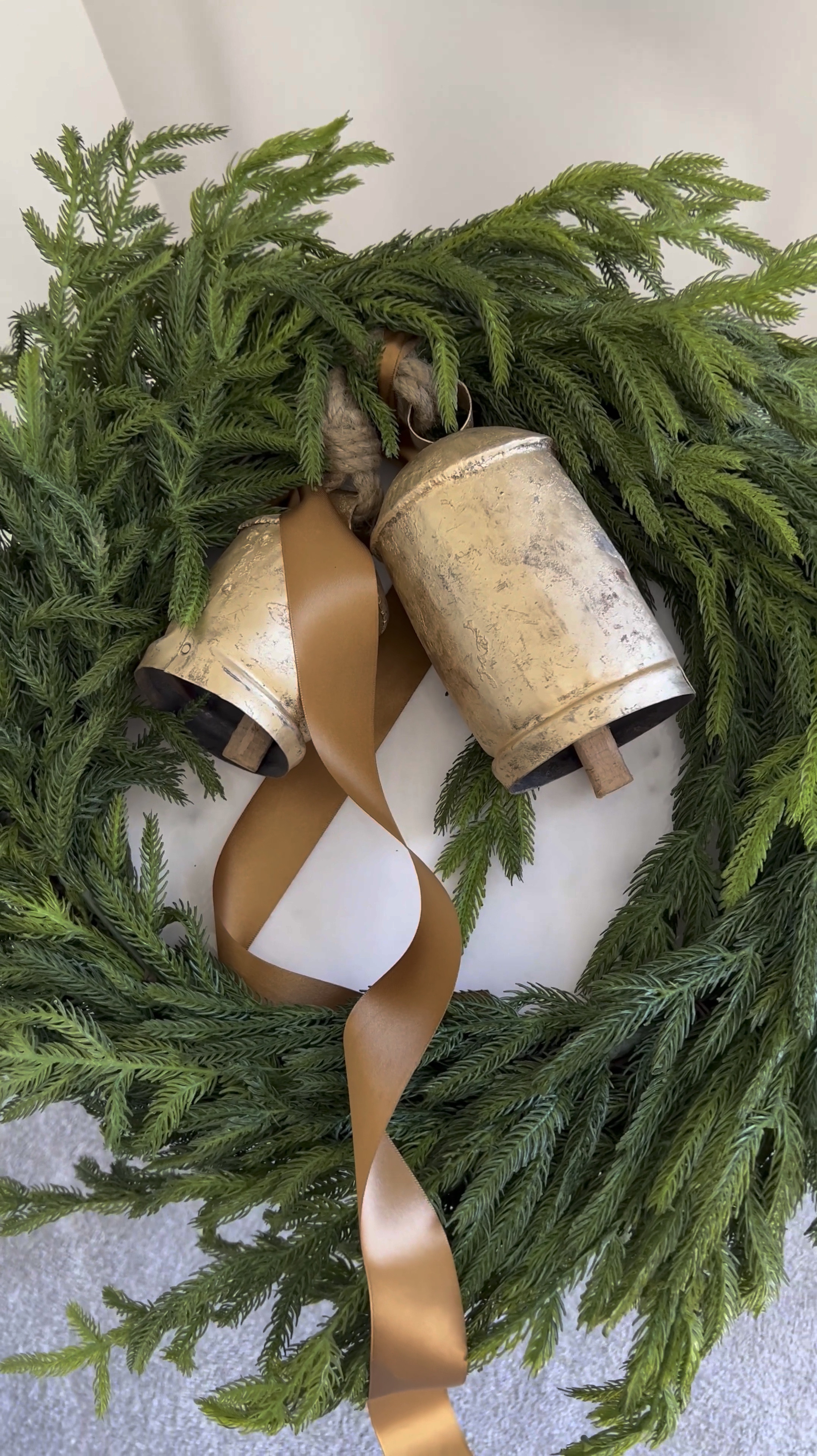 I couldn't resist the trend ,  adding two charming cow bells and a touch of ribbon to this lifelike wreath – it's now got that extra flair! 🌟💕 Curious to see how it transformed my space? Tap the link below and let's ring in some joy together! 🔔

#LTKStyleTip #LTKHome #LTKHoliday