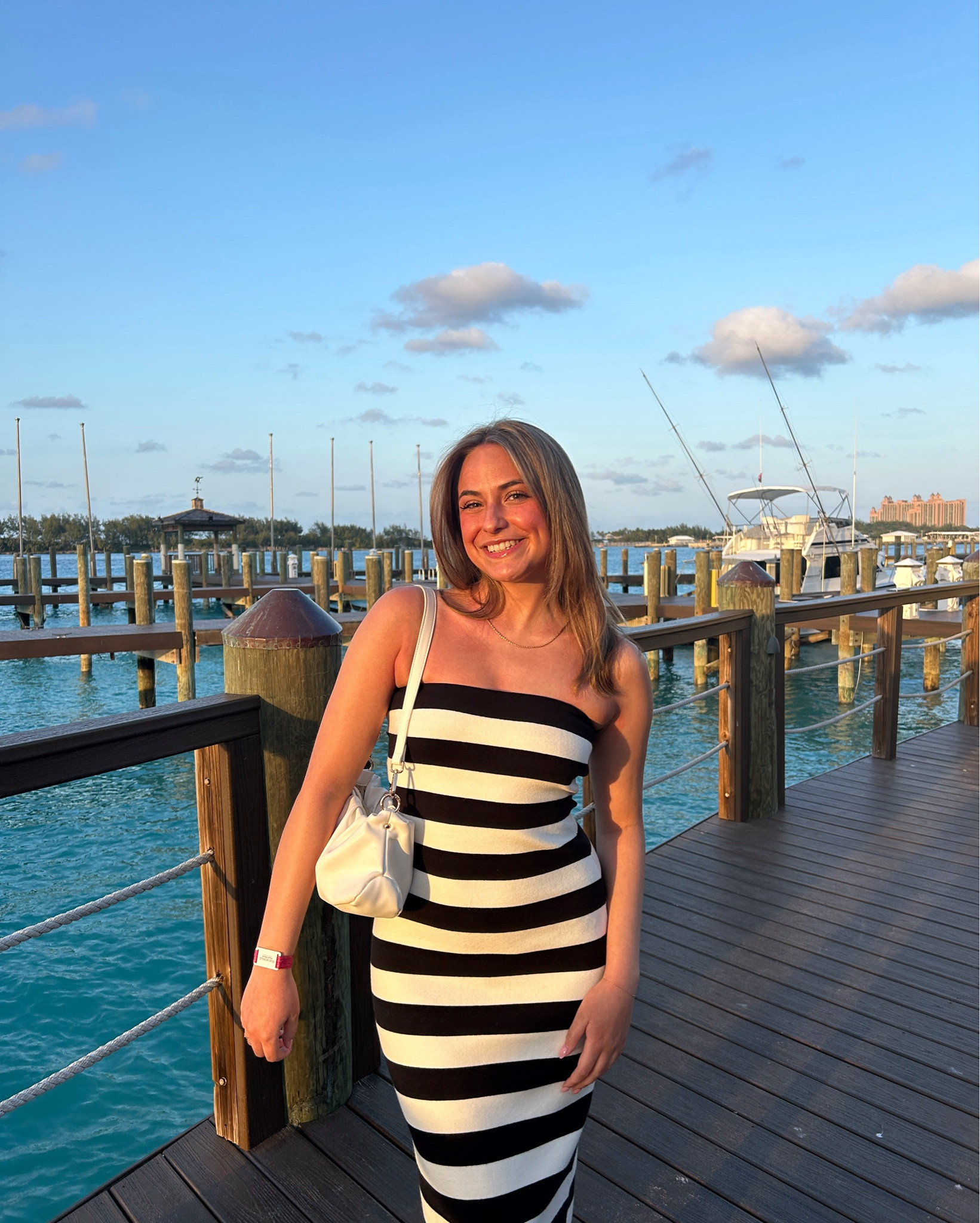 This dress is so flattering and comfortable! 

Abercrombie, Abercrombie dress, vacation dress, sweater dress, striped dress, strapless dress