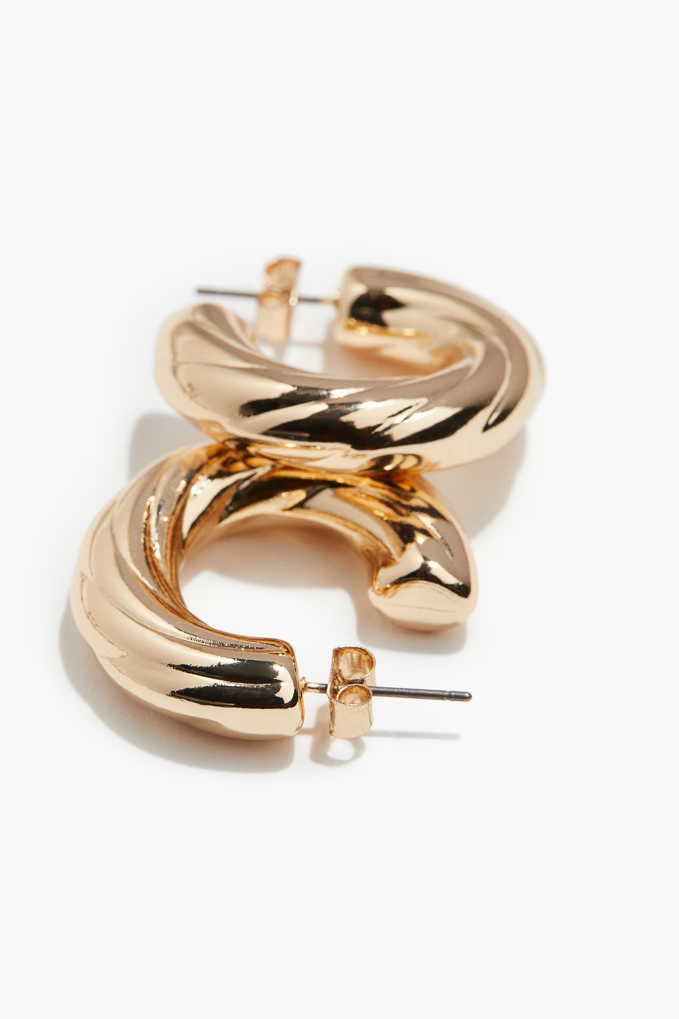 Twisted hoop earrings - Gold-coloured - Ladies | H&M GB | H&M (UK, MY, IN, SG, PH, TW, HK)