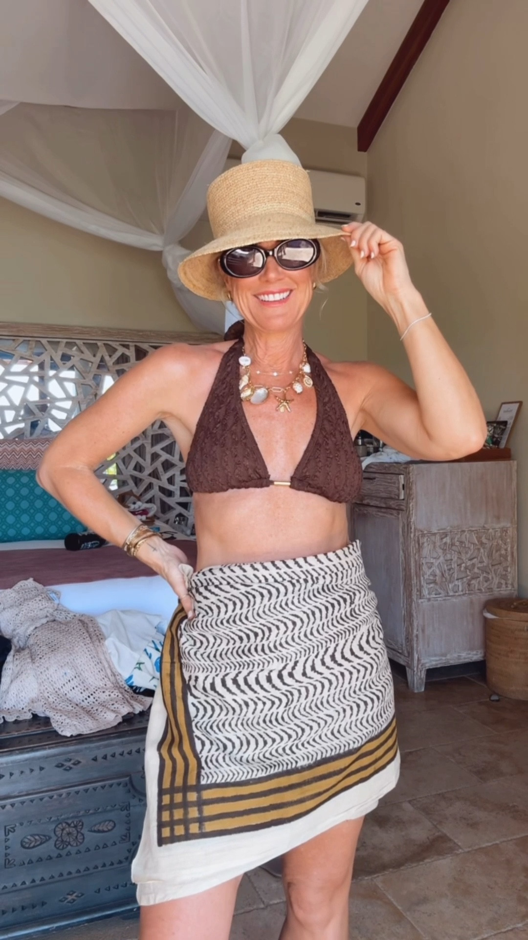An easy poolside look! Love this bikini, it’s so flattering! 

Bikini: small 
Sarong: one-size  

#LTKOver40 #LTKTravel #LTKSeasonal