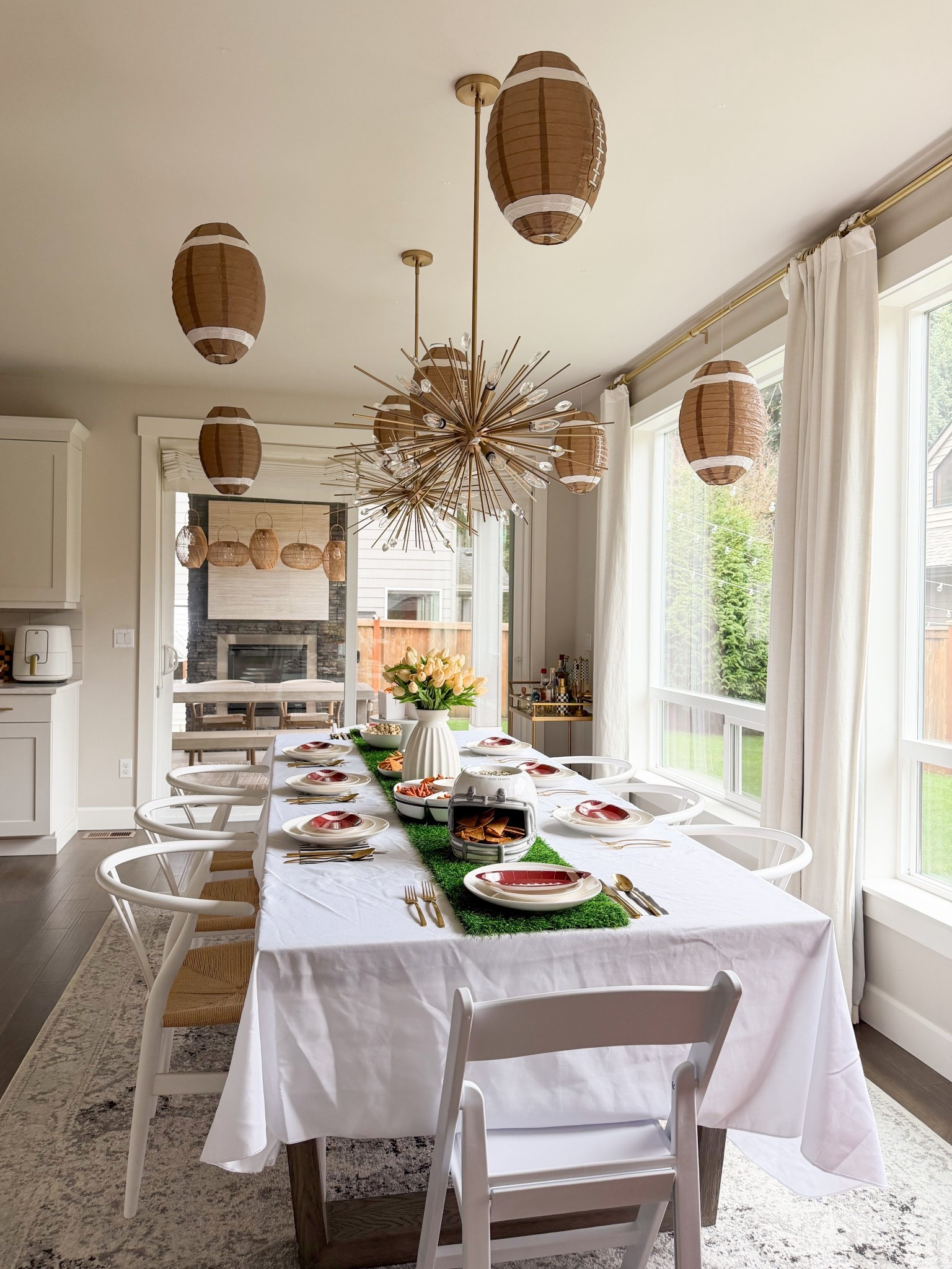 Super Bowl party set up table setting! Game day 

Tablecloth, helmet chip and dip server, football party supplies, table runner, napkins, tulips, popcorn boxes, cake toppers

#LTKHome #LTKSeasonal