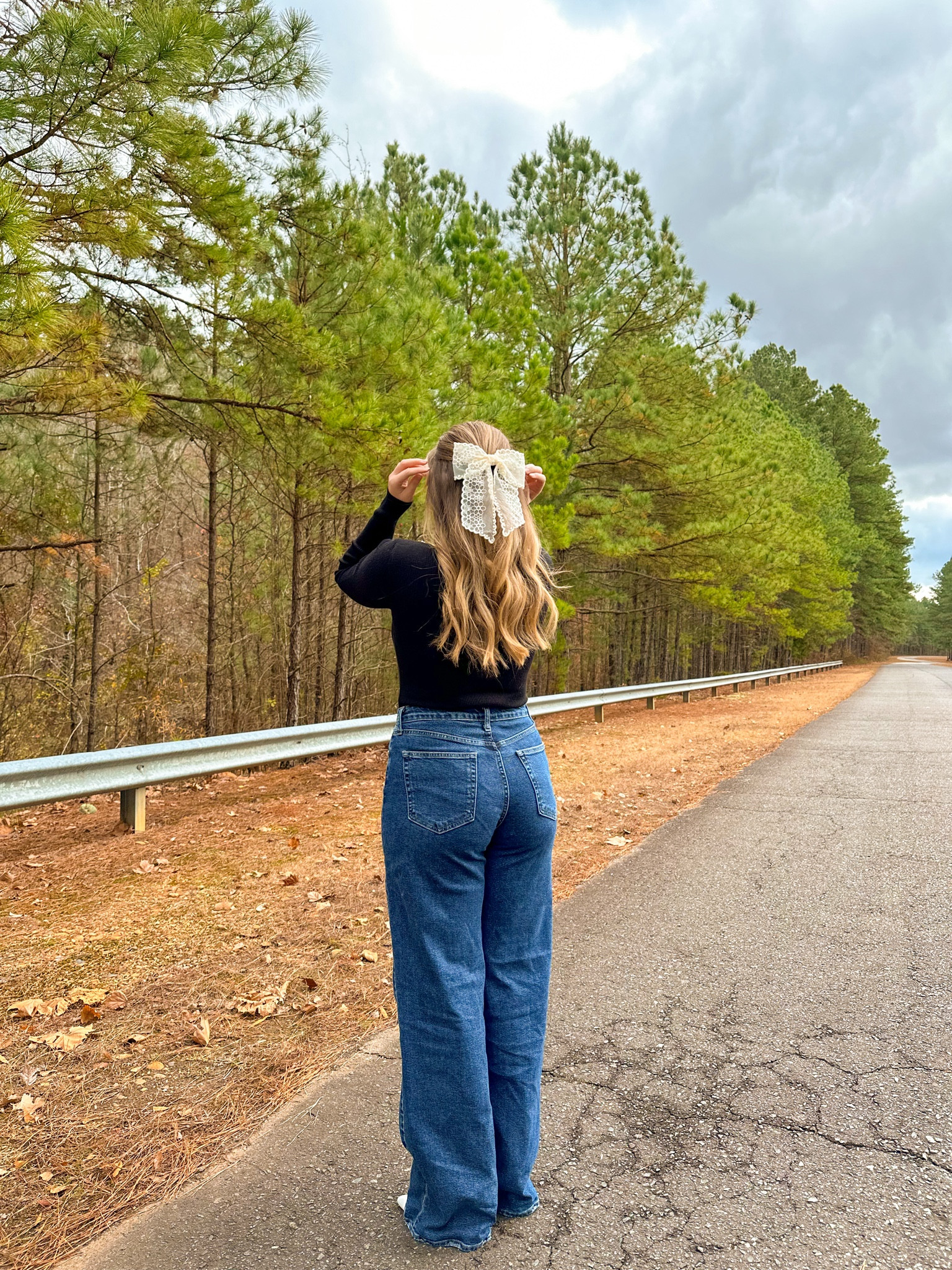 Lulus dark wash jeans and black bodysuit 