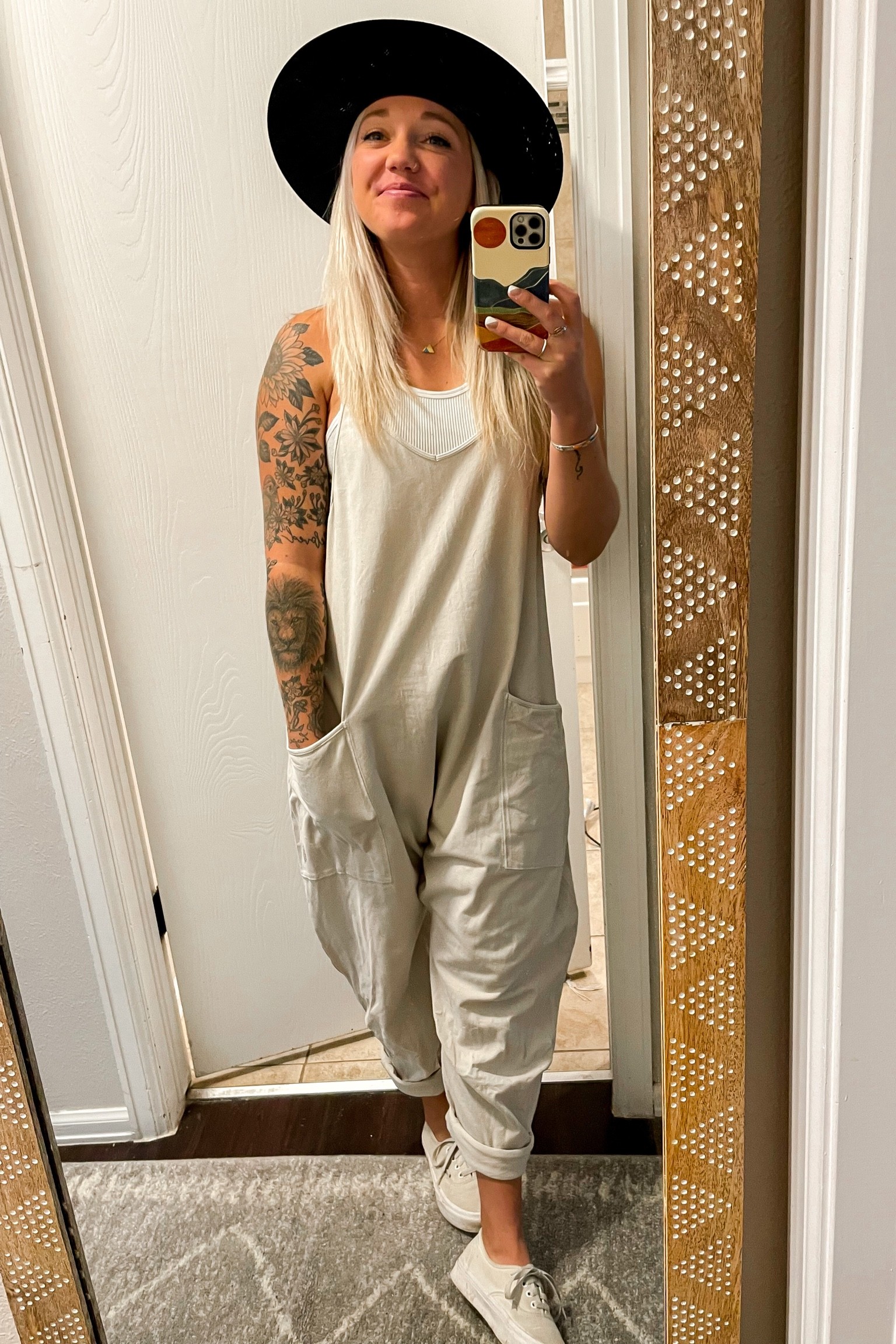 always add a hat 🤠 

jumpsuit - xs 
bralette- xs/s 

hat is kemo sabe 