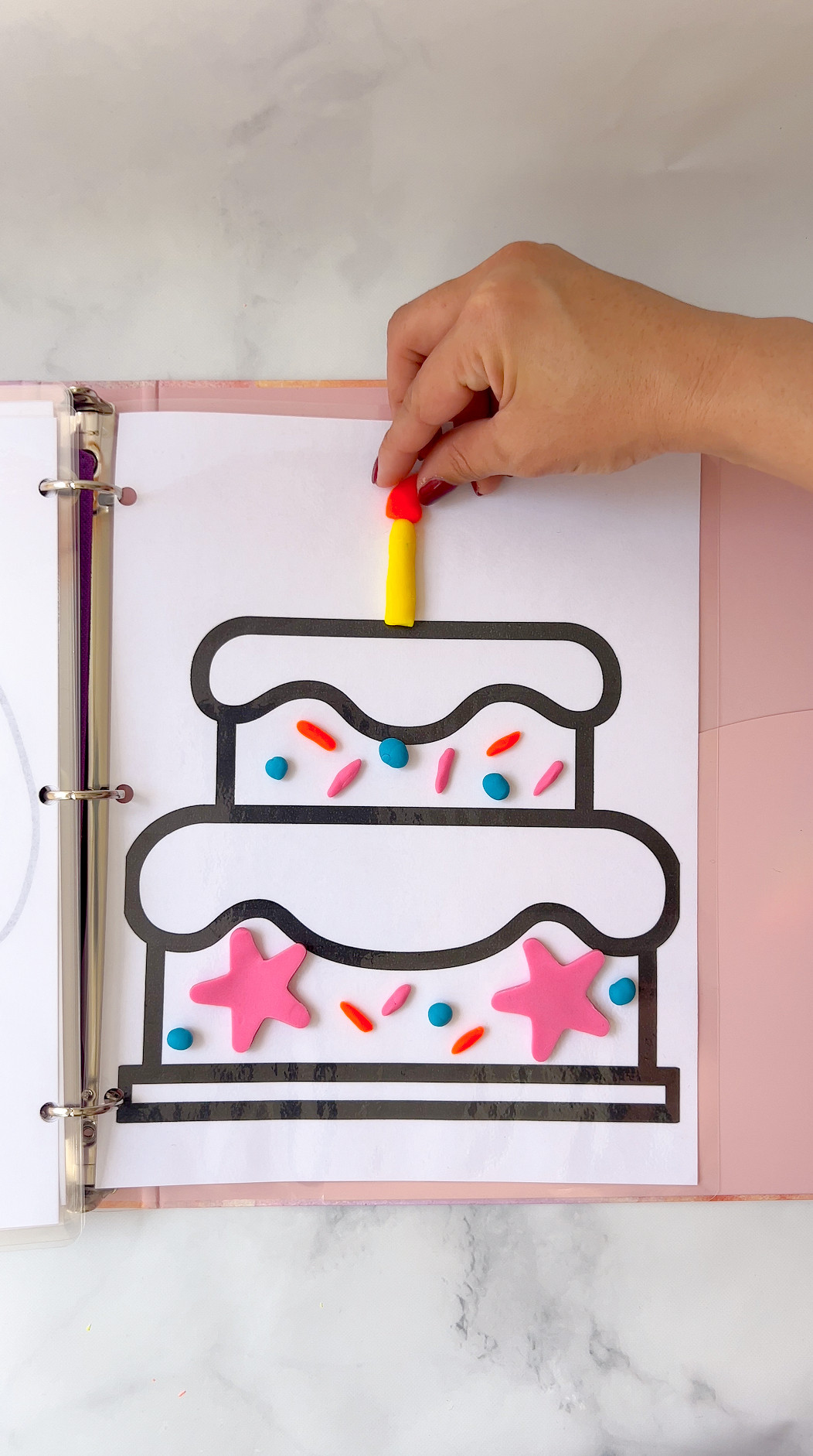 KIDS LOVE THIS!! It's a great way to keep the kids busy, especially on car rides, airplanes, roadtrips, etc. It's reusable and you can use dry erase markers and/or play doh for this busy binder. 

 #LTKKids #LTKFamily