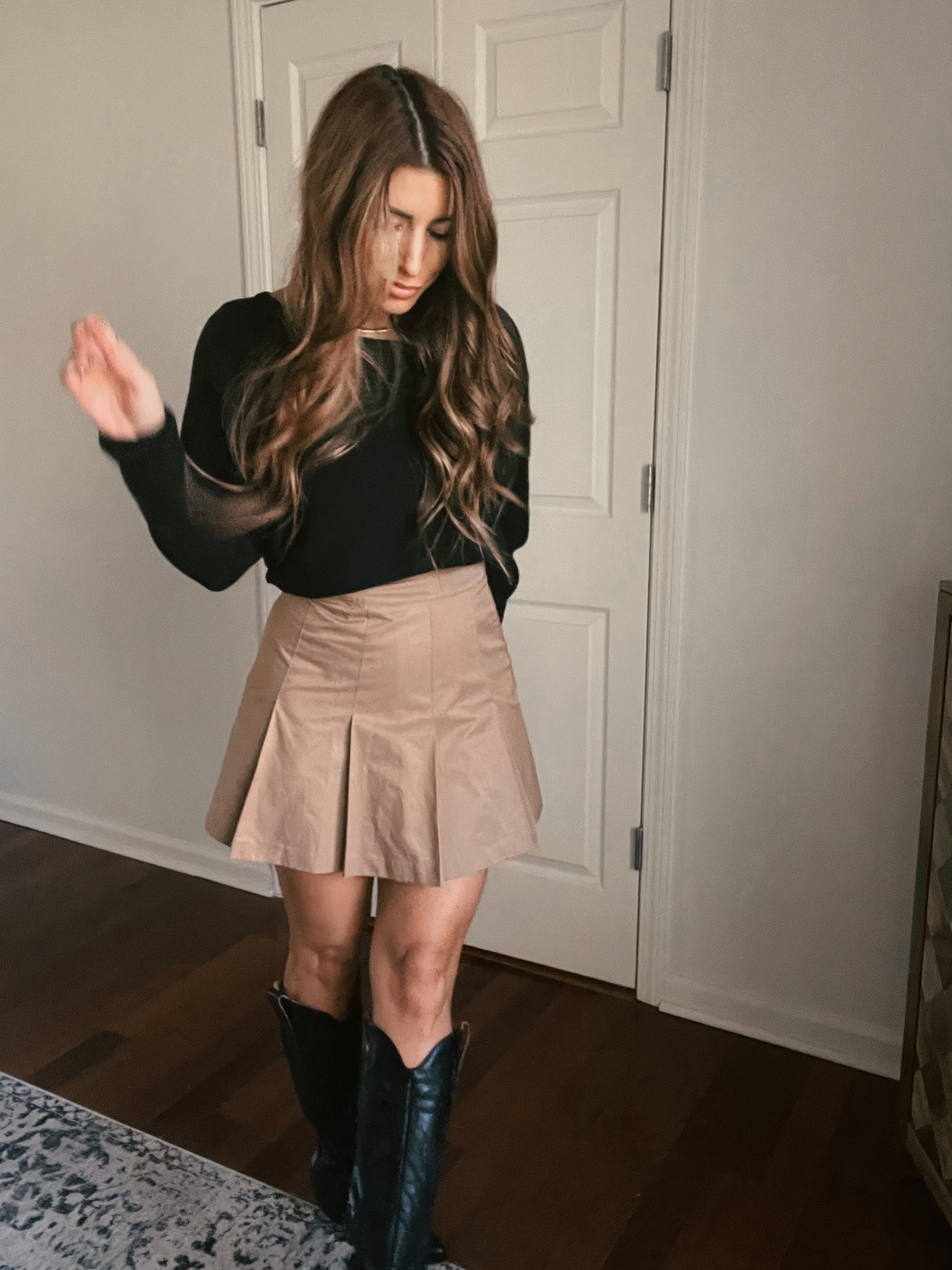 Pleated skirt, cowboy boots  

#LTKSeasonal #LTKHoliday #LTKstyletip