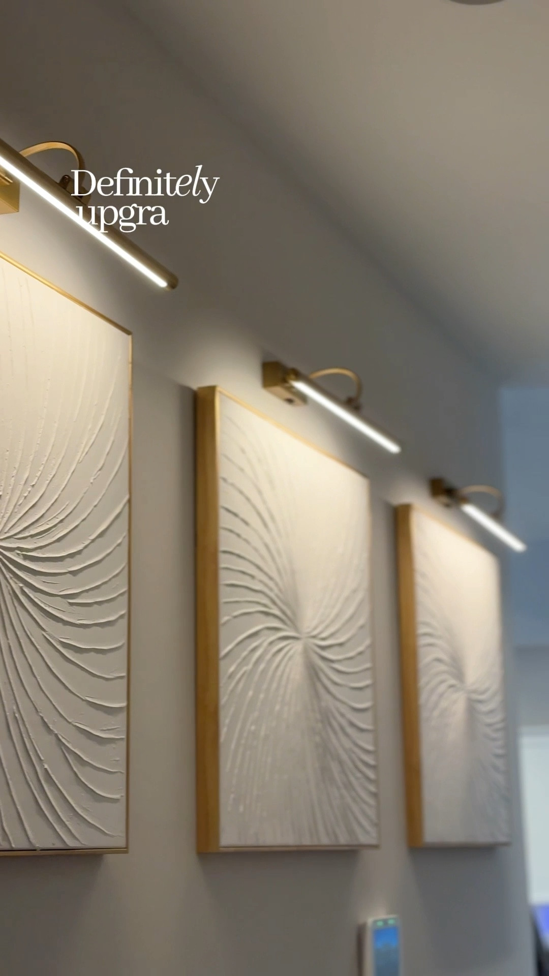 These little picture lights completely changed the mood of my hallway ✨ Rechargeable, dimmable, and so easy to install.

#LTKHome