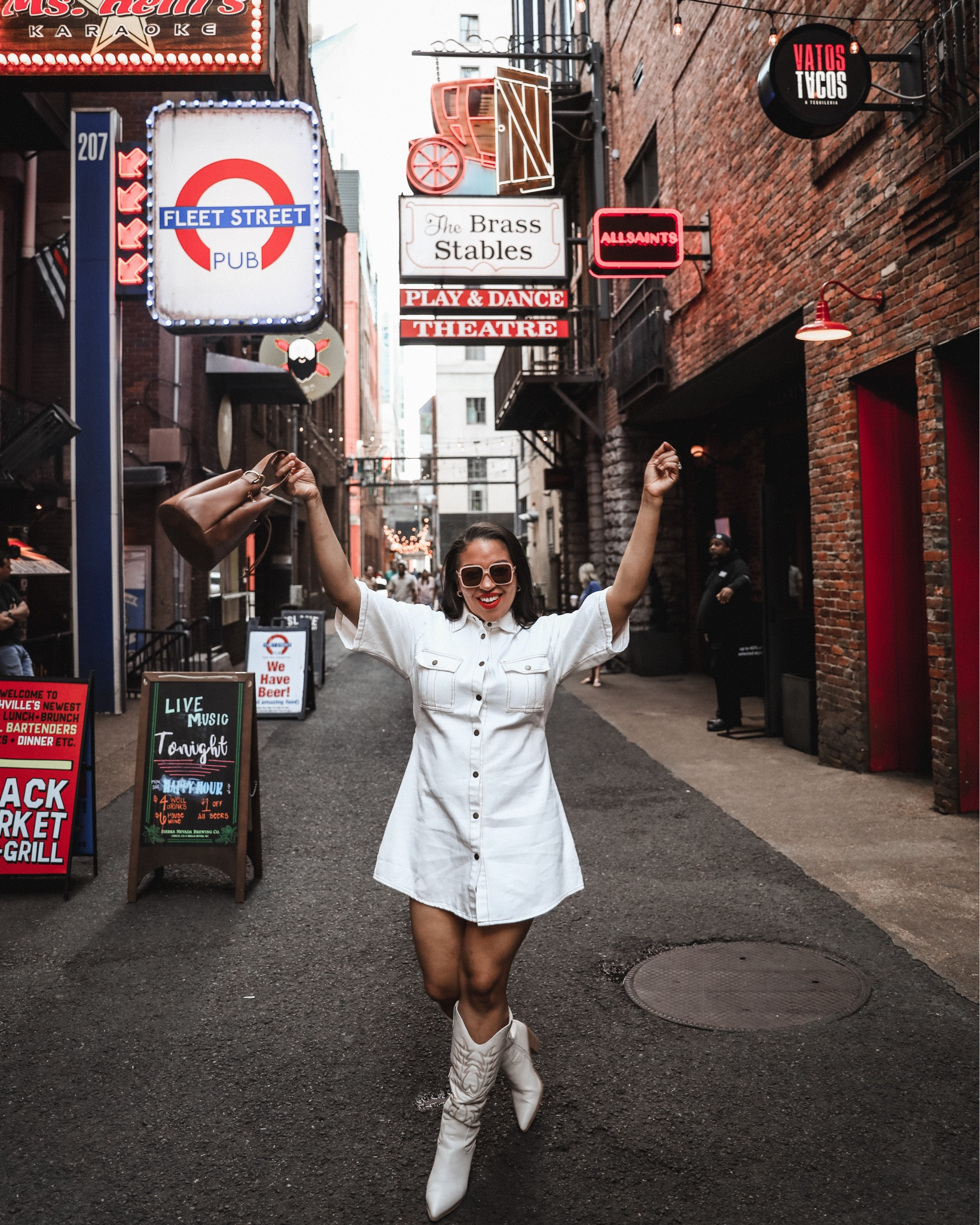 And the category is casual country.✨ This look is perfect for strutting through Nashville’s hidden gem “Printer’s Alley.” This little strip is home to of my favorite clubs @dreamnashville  @dirtylittlesecretnashville and @skullsrr 

Dress: @petalandpup 
Boots: @dolcevita 
Bag: @able 


#LTKfindsunder100 #LTKmidsize #LTKFestival