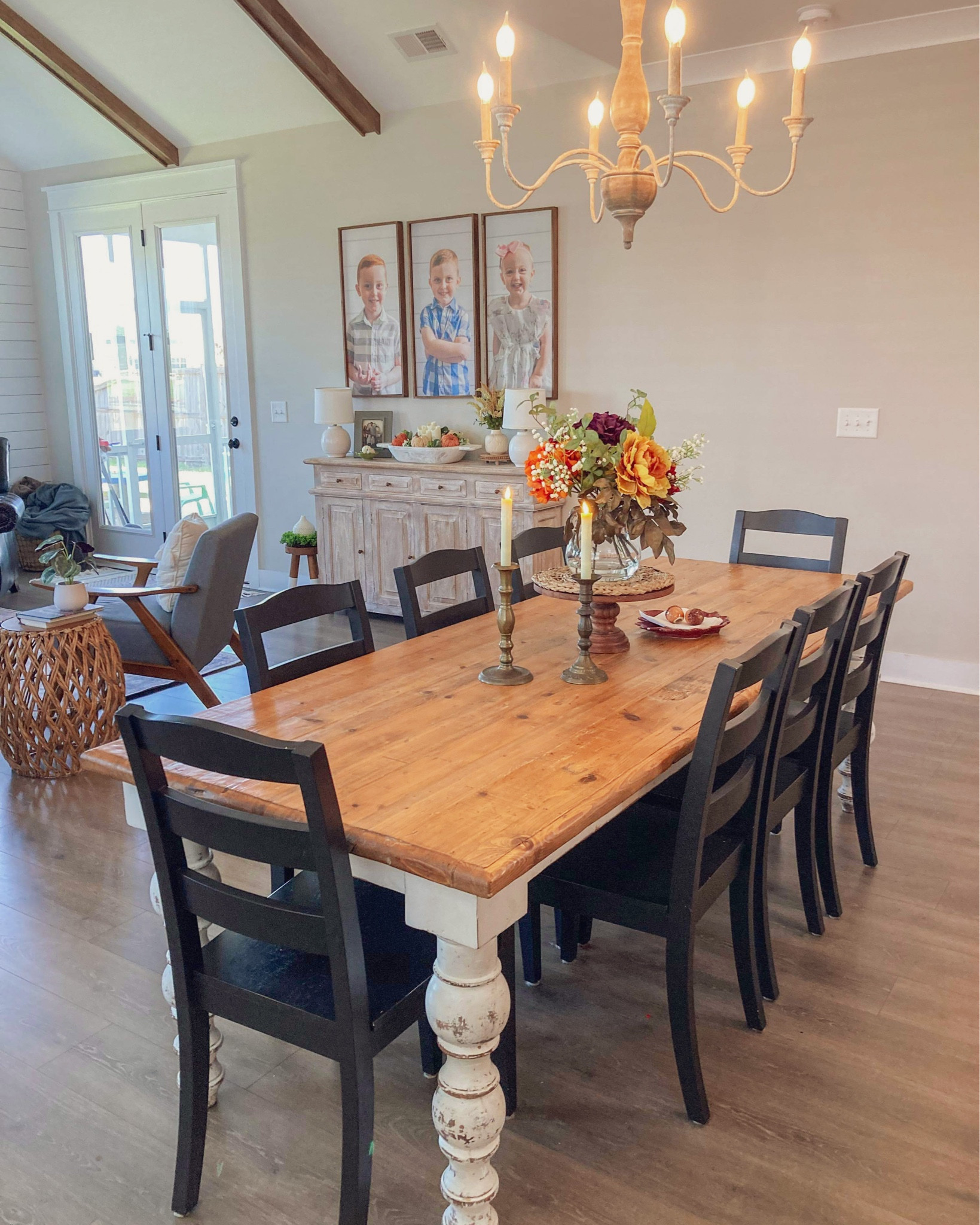 Adding cozy feels to the table by adding tapered candles! They give such a warm inviting vibe to the space. I also added an old ceramic leaf plate with ceramic acorns to hold napkins for style and functionality. 

#LTKstyletip #LTKSeasonal #LTKhome