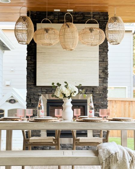 Outdoor dining table and dinnerware, outdoor chairs and rug, acrylic ribbed cups, lanterns 

#LTKhome #LTKparties #LTKSeasonal