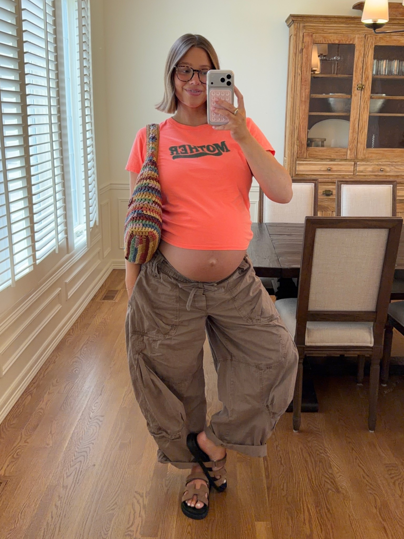 Free people pants size large (end of 3rd trimester so I went up one size) Mother tee runs big wearing a medium it’s so vibrant and cute! Lip liner: Iconic nude + gloss: Fig 👌🏼 Sandals size up 1/2. Coach bag is gorgeous perfect for summer!! 

#coachbrooklyn #coachbag #summerstyle #bresheppard #diml #dayinmylife #freepeople #pregnancystyle #bumpstyle