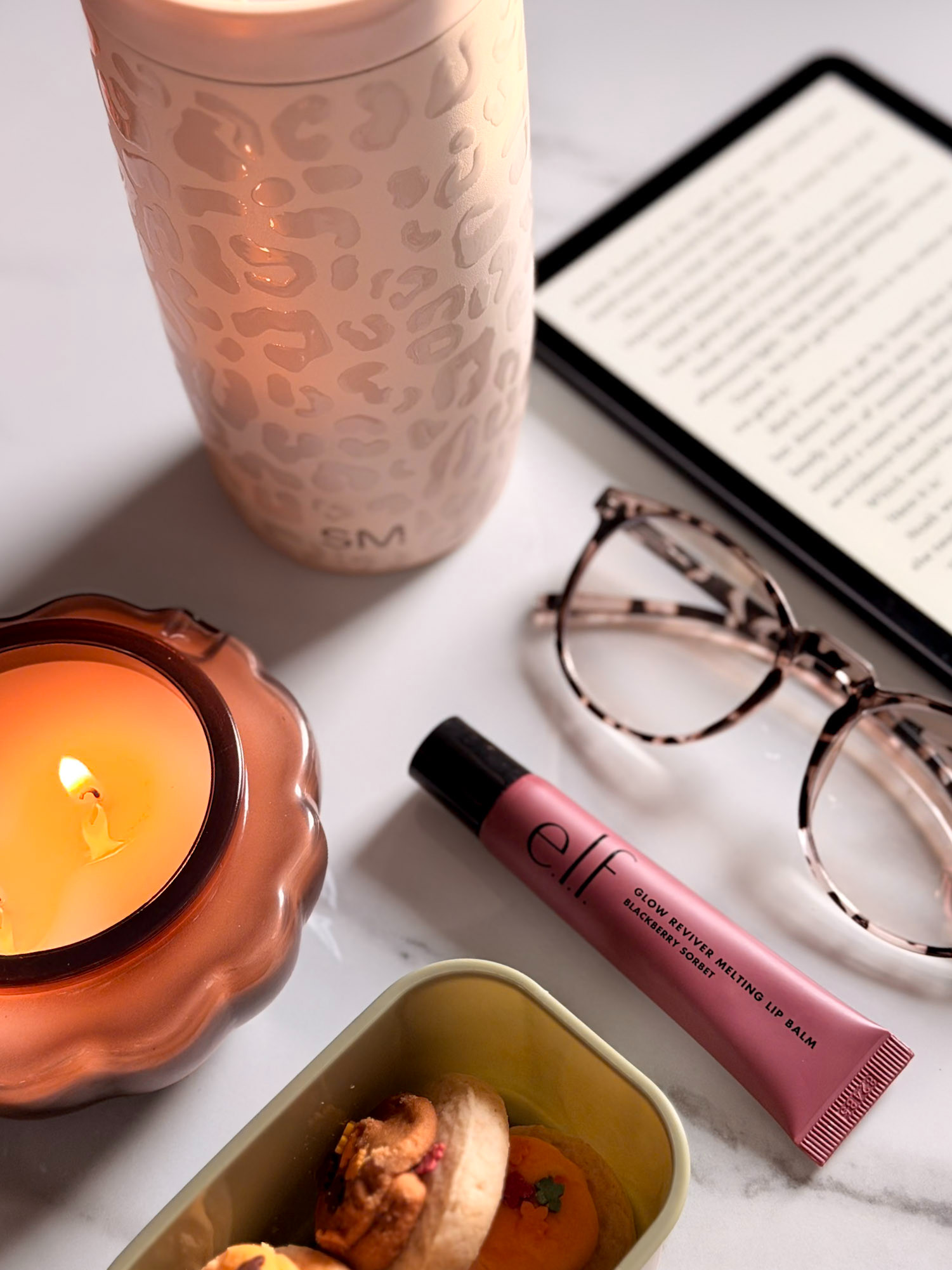 The 20 minutes after the rest of the house goes to bed are for exactly this, and nobody's touching them.

Pumpkin candle lit, leopard tumbler full, tortoise readers on, and a berry lip balm (e.l.f. Blackberry Sorbet) because we're still a little bit fancy. Snacks are not optional.

#LTKmomlife #LTKSeasonal #LTKHome