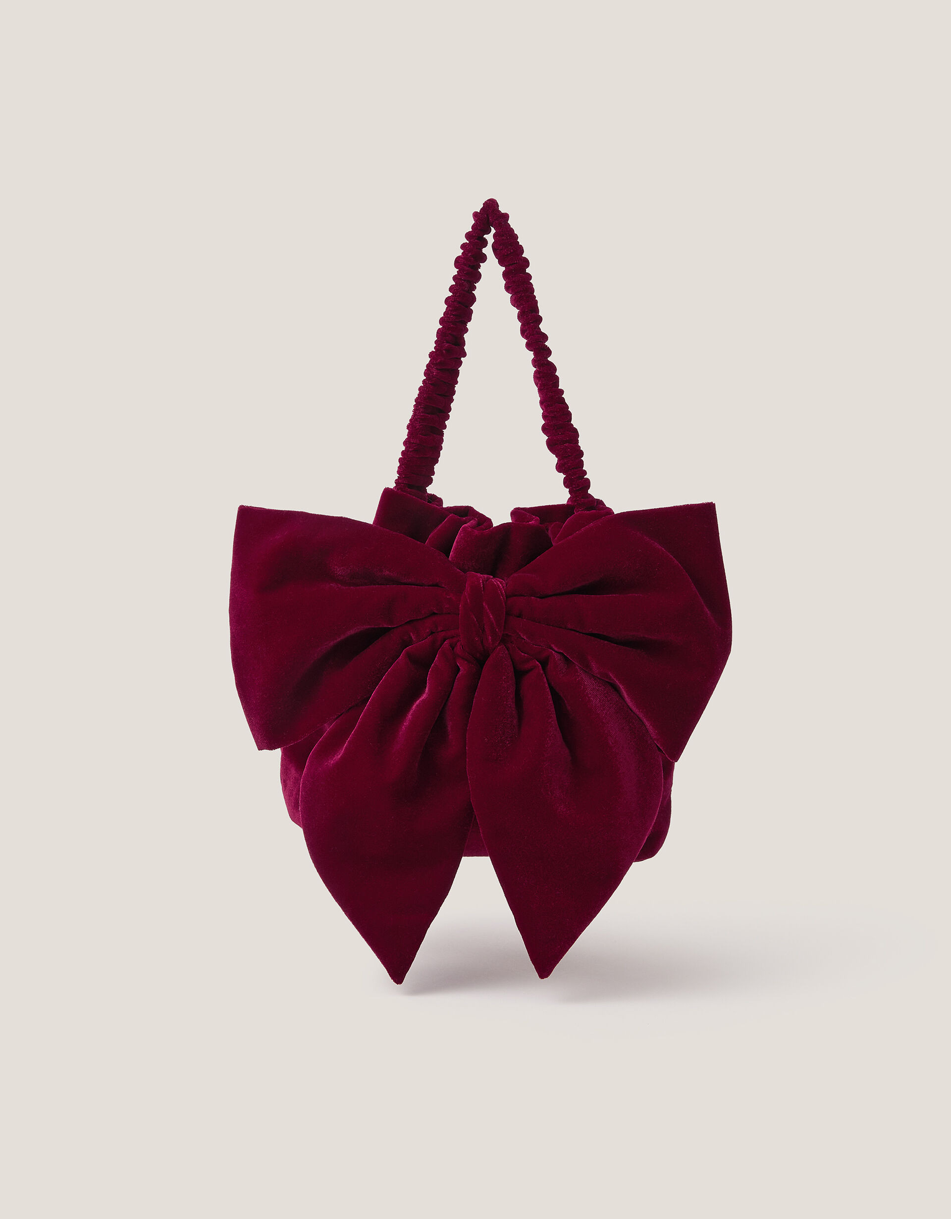Ciri Bow Velvet Pouch Bag | Monsoon (UK)
