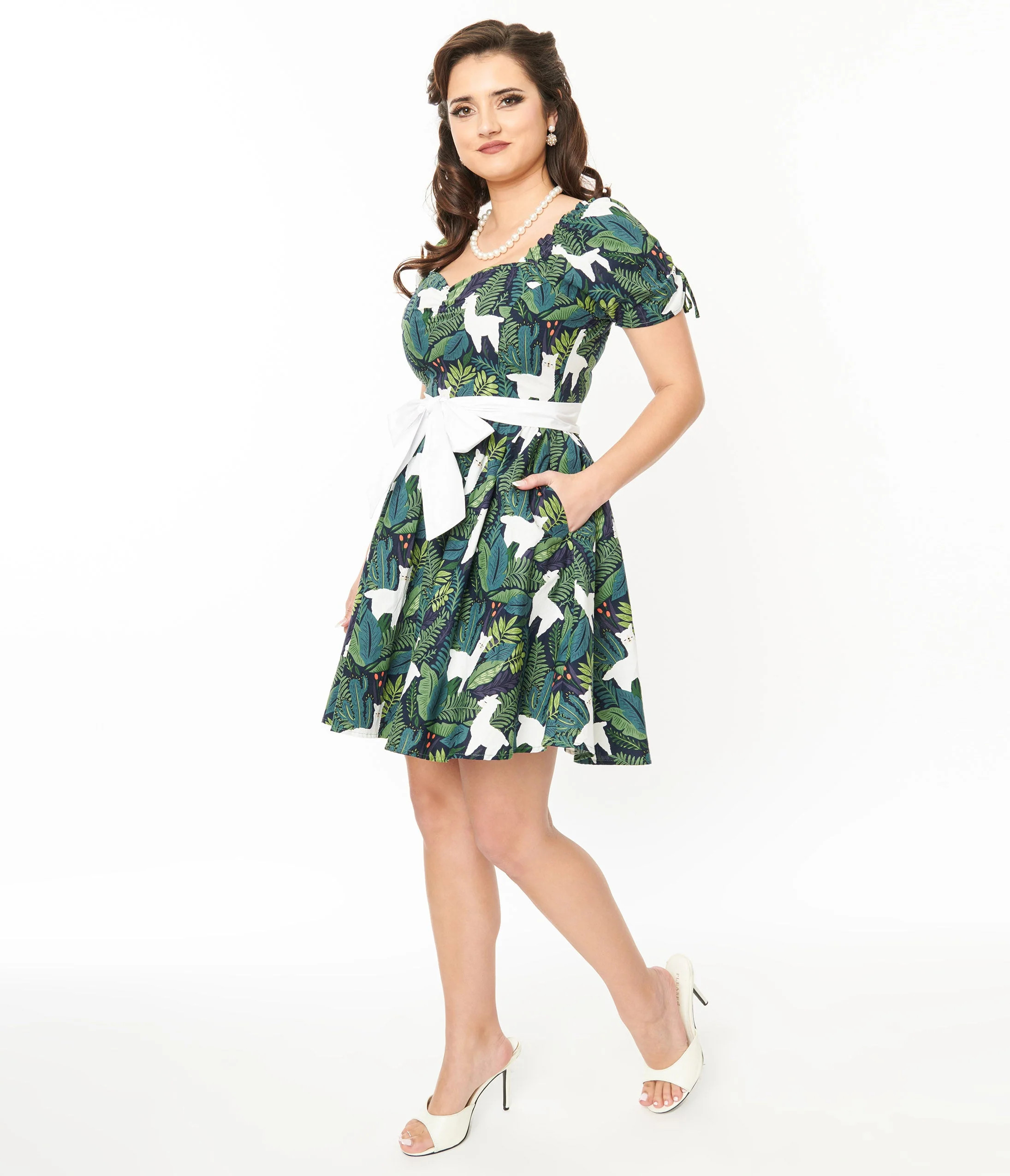 Unique Vintage 1950s Green Leaf & Llama Print Cotton Dakota Flare Dress | UniqueVintage