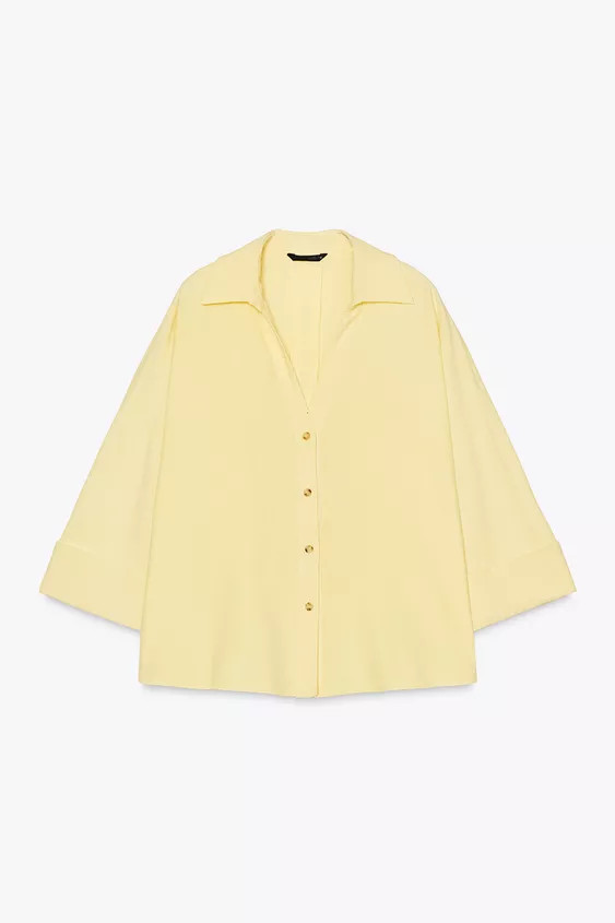 Collared shirt with a v-neck and wide sleeves finishing below the elbow with a turn-up. Button-up... | Zara UK