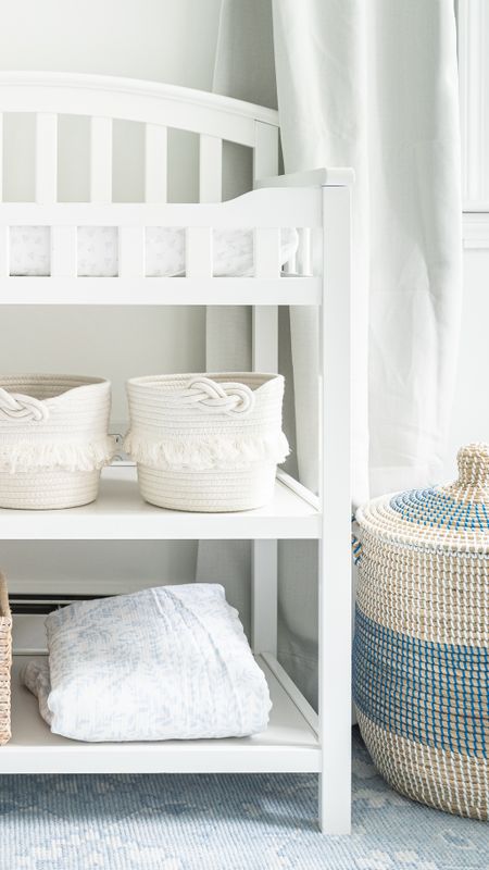 Neutral baby nursery, coastal style home decor, including white changing table, woven baskets, seagrass, storage baskets, and Serena and Lily betting

#LTKhome #LTKfamily #LTKbaby