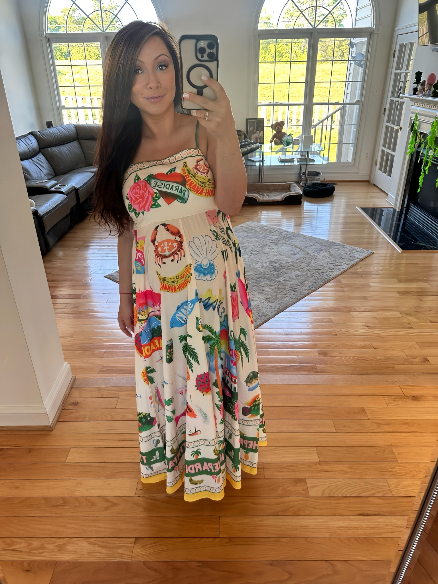 This dress is pure vacation energy—bold, colorful, and oh-so-comfy, even with the bump! I love how the fun print brings all the island vibes while still feeling effortlessly chic. 

#LTKSeasonal #LTKBump #LTKTravel