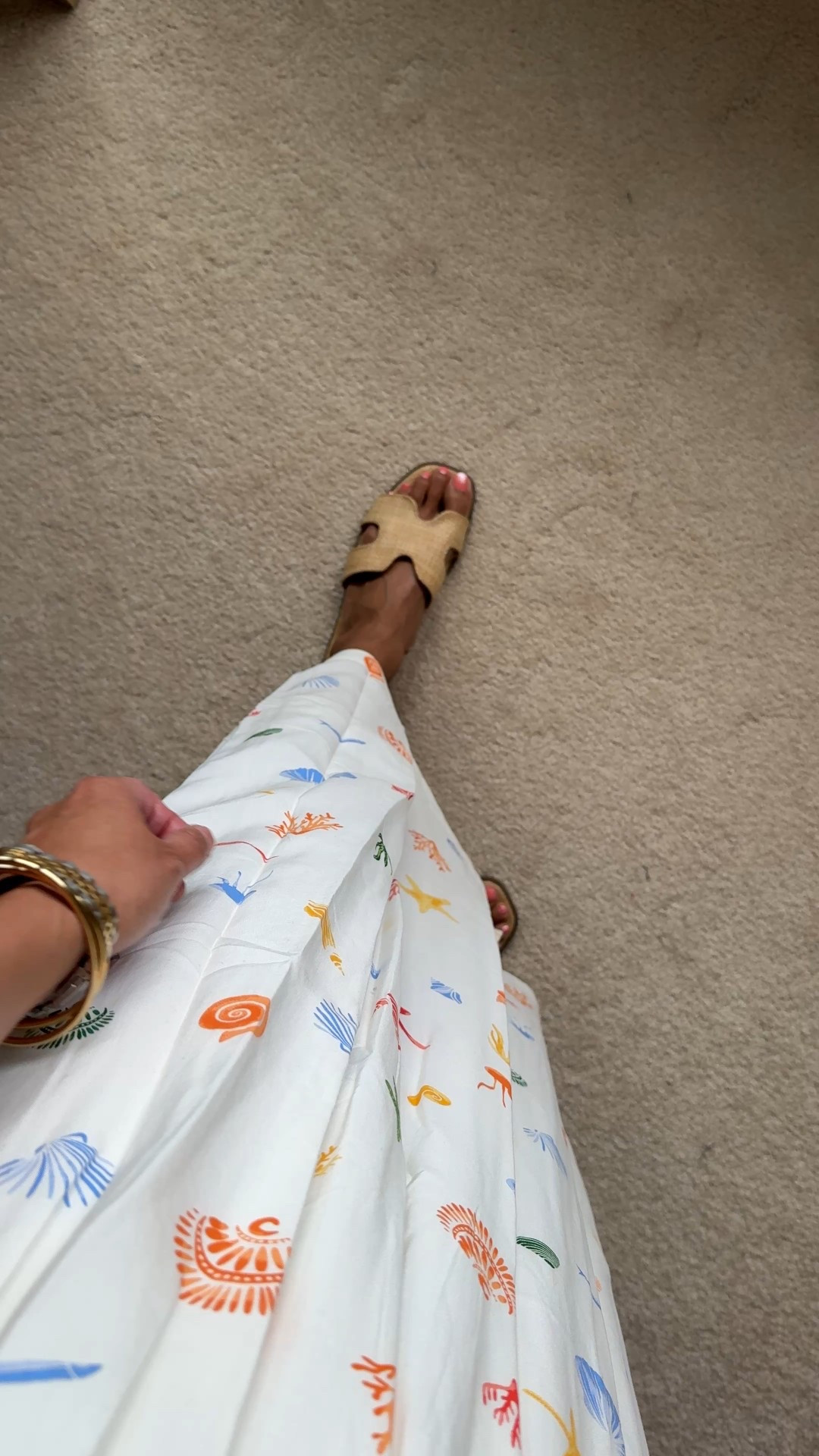 Simple beach vacation outfit inspo. 
Easy breezy dress, slide sandals, woven bag, delicate necklace with a pop of color. 
- Exact dress looks boutique-y, but is $35. Lined, adjustable straps, stretchy bodice. Comes in multiple colors. I love this beach themed print. True to size. 
- Slide sandals with designer style; $20. 
- Small heart pendant in red makes a nice little statement.  Linking options  
- Woven bag comes with 2 straps. 


#LTKFindsUnder50 #LTKOver40 #LTKTravel