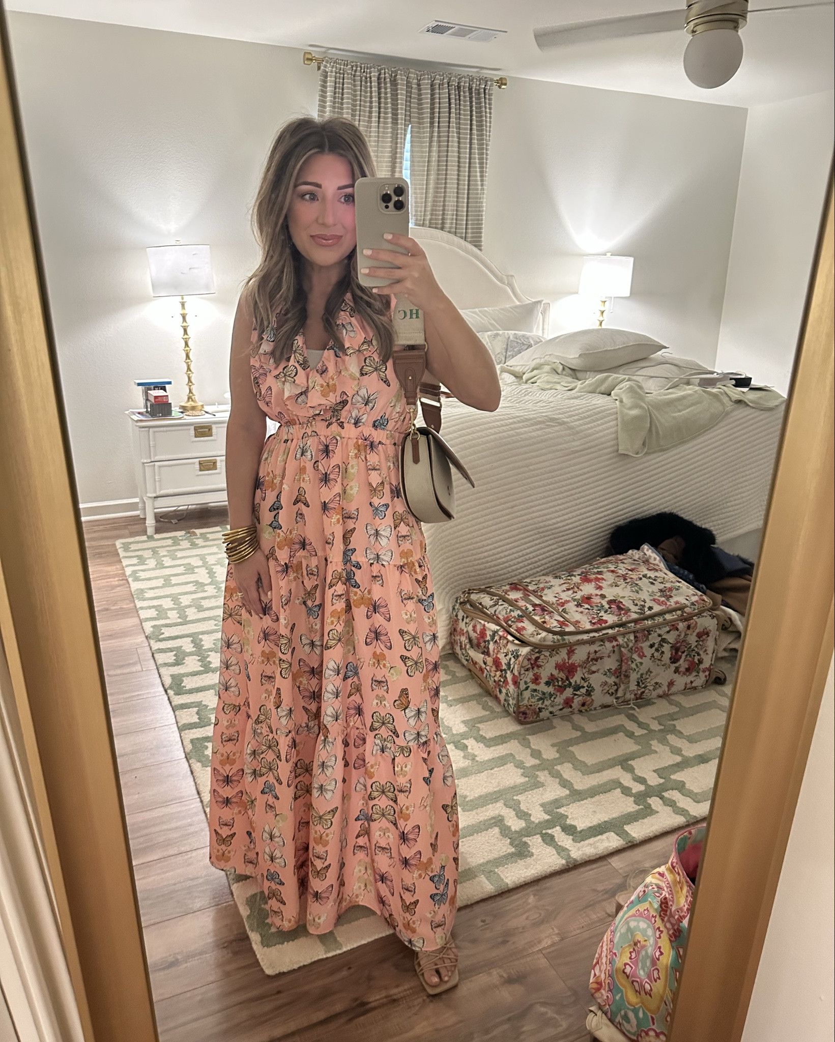 Showered baby Estelle this past weekend in this precious #buddylove maxi dress covered in butterflies! 🦋🩷

Buddy Love isn’t carrying the pink at the moment, but I did link the same exact dress in black (it’s SO cute) and found some very similar butterfly prints perfect for the occasion! Linked this exact dress carried at a boutique - sizes limited. 
I’m wearing the small. Purse is Zara!

baby shower dress, baby girl, Easter dress, spring dress, brunch dress, church dress, pink maxi, butterflies, butterfly, butterfly dress, butterfly maxi dress, buddy love