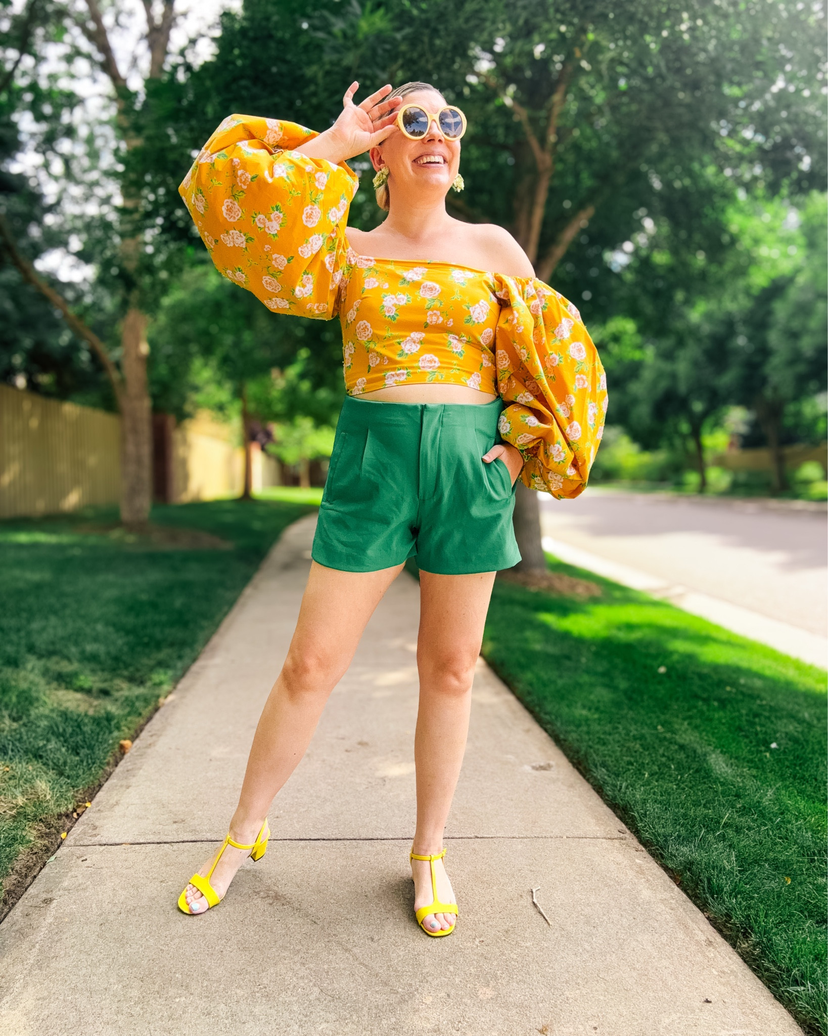 Look 8 - The Life of the Party
👒 The Garden Society

She’s definitely got something up her sleeve. 🌼✨ 😉 
This Garden Society look is all drama (the good kind) - with voluminous floral sleeves, sunshine yellow tones, and a touch of going-out glam. Perfect for a rooftop rendezvous or a dinner with friends, it’s high-low styling at its best: luxury accessories meet budget-friendly shorts and shoes.

About this series:
The Garden Society capsule is my ode to maximalist summer dressing filled with color, character, and just a hint of whimsy. Each look tells its own little story.

Save this one for later and stay tuned - tomorrow’s look brings a whole new character into the garden. 🌸🌙

Top - Caroline Constas (linked - available to rent through RTR use my link below for a discount!)
Shorts - Target 
Shoes - from my old boutique
Sunglasses - Gucci (linked for purchase and rent)
Earrings - Oscar de la Renta (linked available for rent!)
Bracelet - spartina 449 (similar linked)

#CarolineConstas #RentTheRunway #GardenSocietyCapsule #SummerStyleEdit #HighLowLook #StatementSleeves #YellowFloral #NightOutStyle #SummerCapsule #MaximalistStyle #WhatToWearTonight #BoldStyleChoices #preppyoutfit

#LTKStyleTip #LTKSeasonal