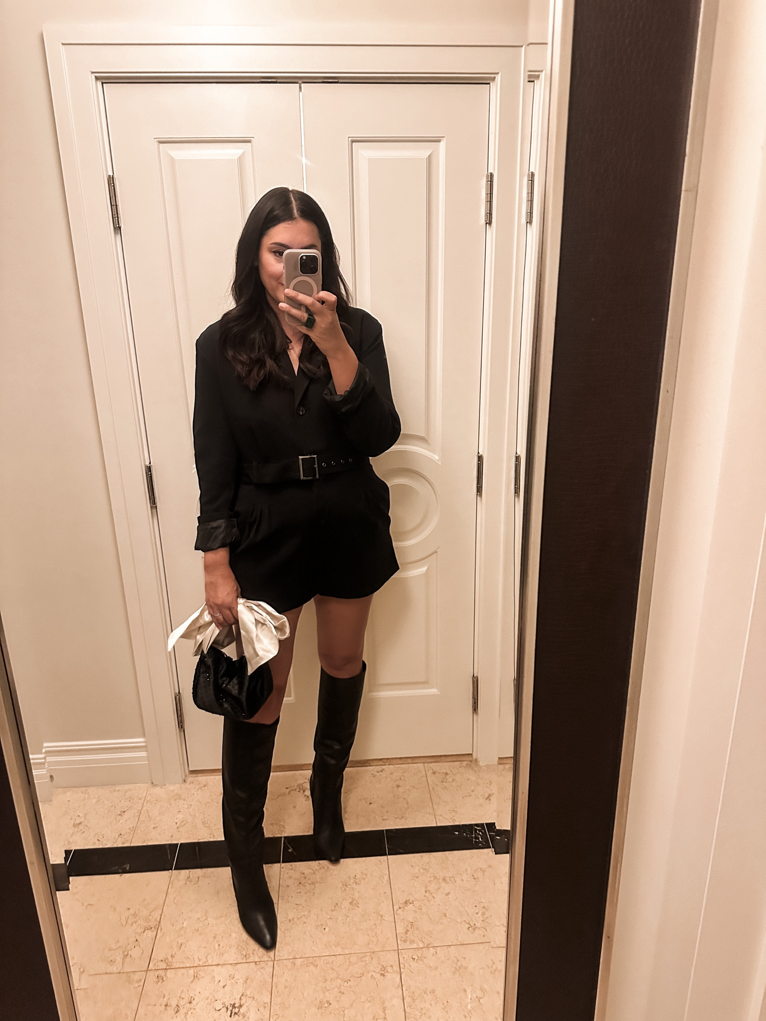 This blazer jumpsuit is so good! Im in the medium, but it does run short. It fits perfectly tho! 

The boots run narrow but TTS. 