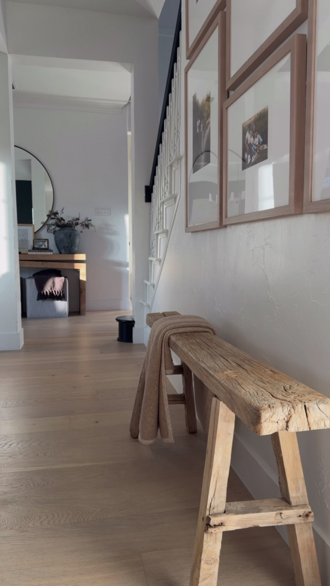 Entryway/hall details linked up here for you! 

Wood bench, patina, console styling, henn console, gallery wall, matted frames, wood frames 

#LTKHome