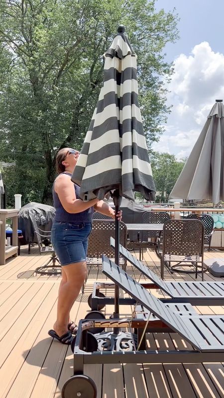 Turn your patio into a Resort retreat with this chic black and white striped umbrella. 

☀️ For under $60, it's an absolute steal from Walmart. I bought several last year to provide shade throughout my yard and they have held up so good! 