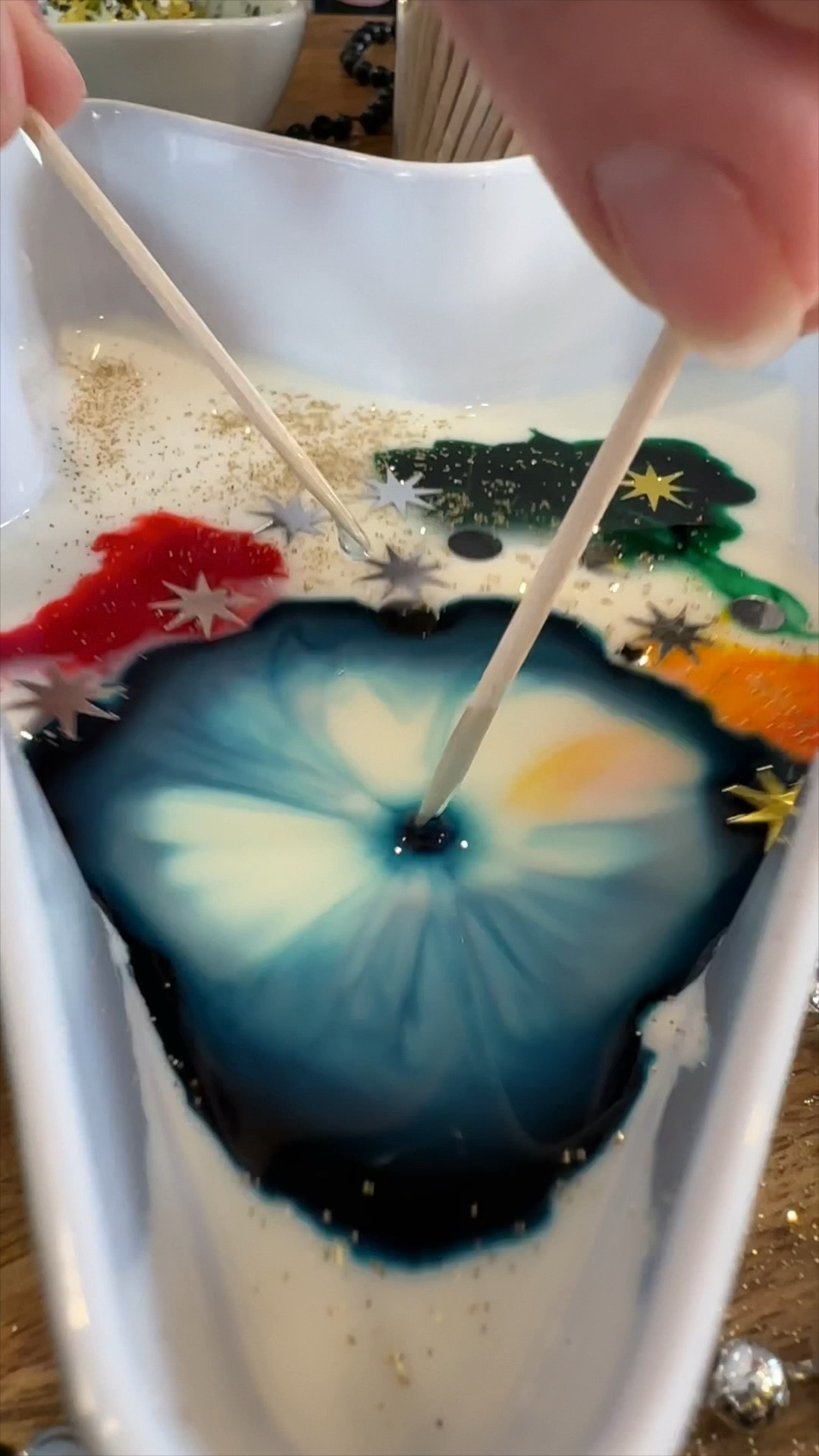 Ring in the New Year with some sparkling milk fireworks! 🎇✨ Add whole milk to a dish, sprinkle in glitter, food coloring, and confetti, then dip a toothpick in dish soap to watch the magic happen! 🌀 A fun and festive activity to bring in the new year with a bang—perfect for kids and adults alike! 🌈🥳 #NewYearsFun #MilkFireworks #FamilyActivities #NewYearsEve #STEMActivities #HappyNewYear 

#LTKHome #LTKFamily #LTKHoliday