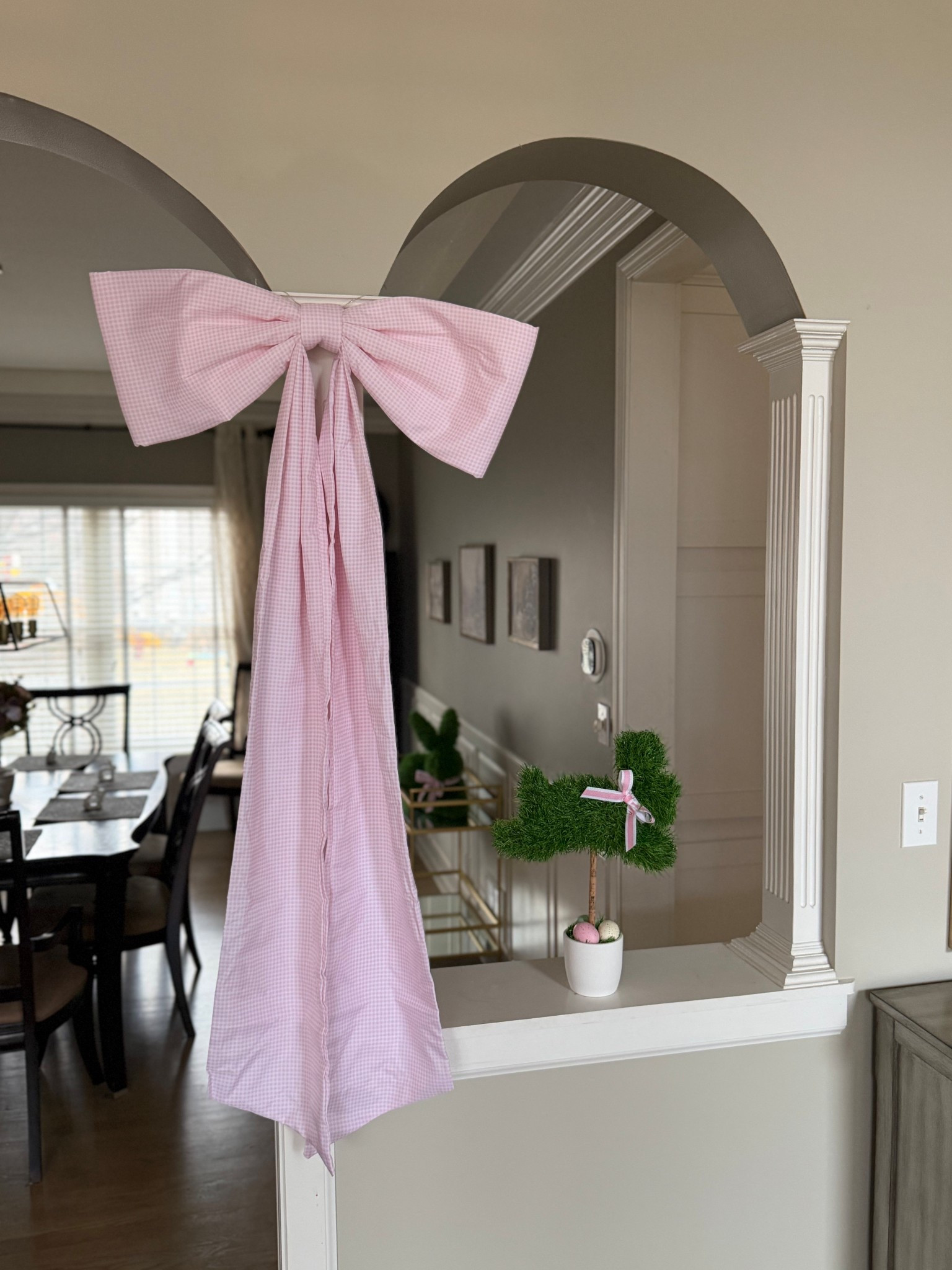 The oversized gingham bow from Walmart might be my favorite spring detail yet 🎀🌸 it instantly softens the space and makes this little arch feel Easter-ready without doing the most.

Simple, sweet, and such a statement.

#springdecor #walmartfinds #easterdecor #ginghambow #homesweethome #seasonalstyling #pinkdecor

#LTKhome #LTKSeasonal #LTKfindsunder50