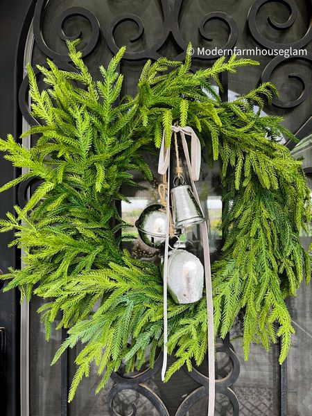 Natural realistic looking pine Christmas wreath at Modern Farmhouse Glam  silver bells velvet ribbon front door holiday decorations decor afloral 

#LTKHoliday #LTKfindsunder100 #LTKSeasonal