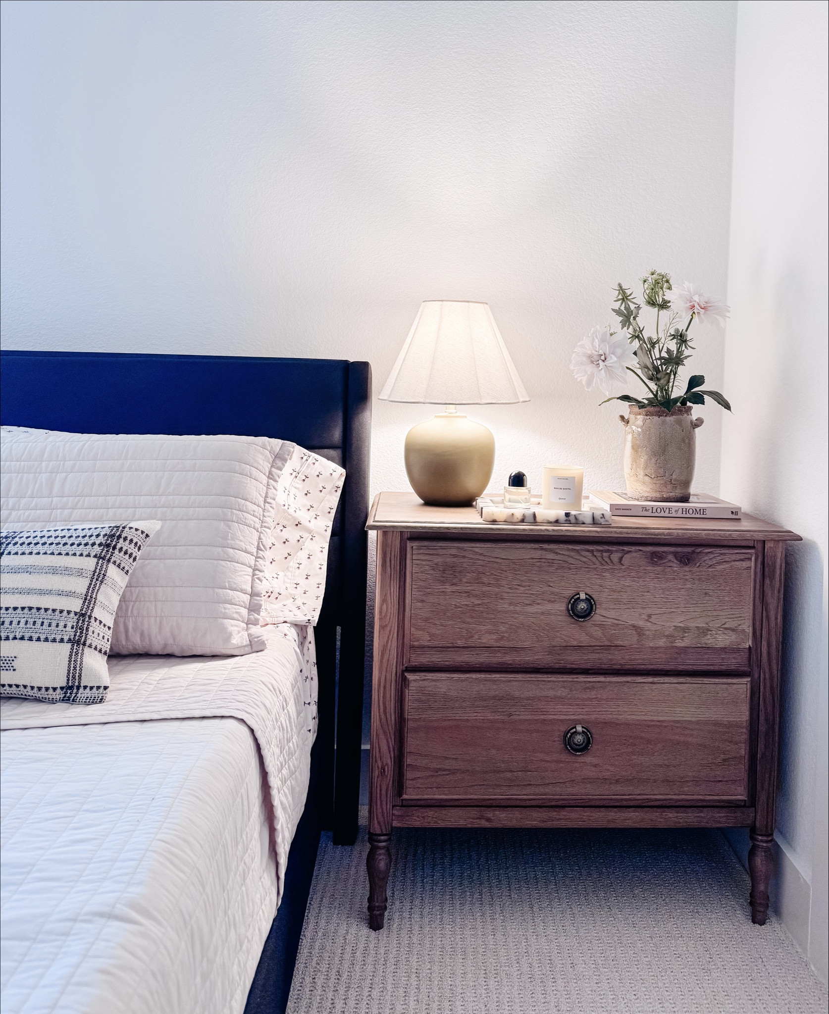 Sunday night cozy with my favorite neutral bedroom details 🤍 Soft lighting, layered textures, and simple nightstand styling make such a difference in how a space feels at the end of the day. Everything here is timeless, calming, and easy to recreate — perfect for a cozy, lived-in bedroom you’ll love year-round. Save this for bedroom refresh inspiration. Bedding refresh, 

#LTKHome #LTKFindsUnder100 #LTKSaleAlert