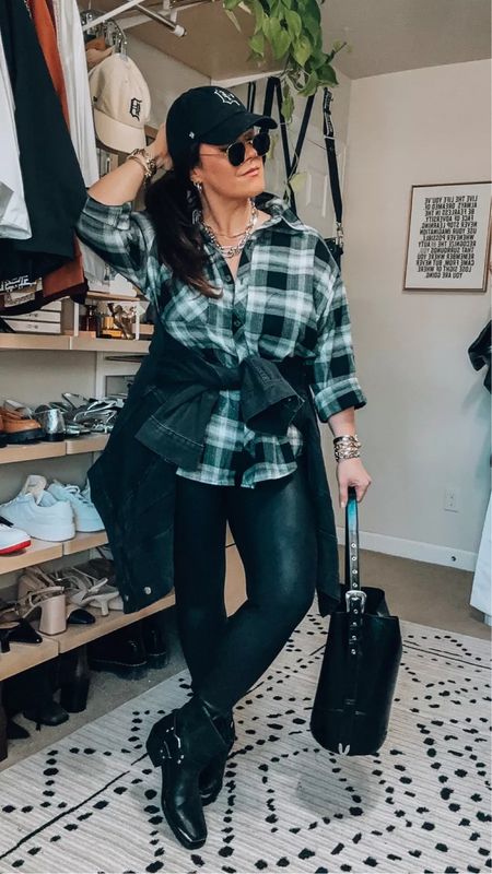 Midsize fall outfit idea - flannel plaid button down top wearing an xl (it has pockets) Faux leather leggings are a 1x petite (size up one) I am 5’6 for reference! CODE: TARYNTRULYXSPANX Moto boots Boyfriend black denim jacket large Bucket bag Mixed metal accessories

#LTKmidsize #LTKSeasonal #LTKstyletip