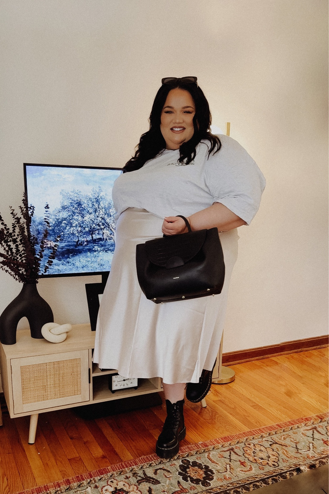 Pinterest to plus size outfit! I’ve added as many plus size graphic tees that I could find that I think would go great with this skirt! 

#LTKstyletip #LTKcurves #LTKshoecrush