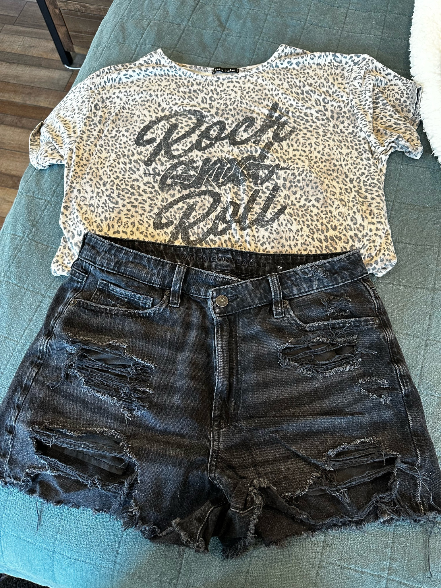 Vacation outfit day 1. I picked out a leopard t-shirt that is slightly oversized and super soft that I tucked into my black American Eagle shorts. For shoes I chose a pair of black sandals! 

Animal print, graphic tee

#LTKFind #LTKstyletip