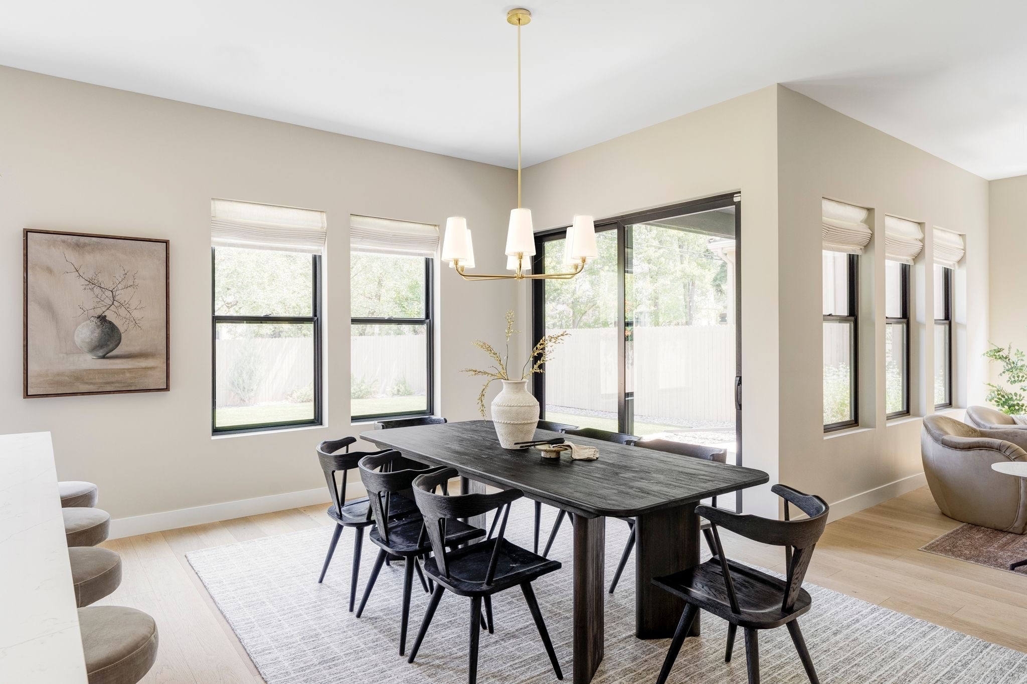 Dining room with black dining chairs dark dining table and grey rug 

Dining, dining room, dining chairs, rug

#LTKHome