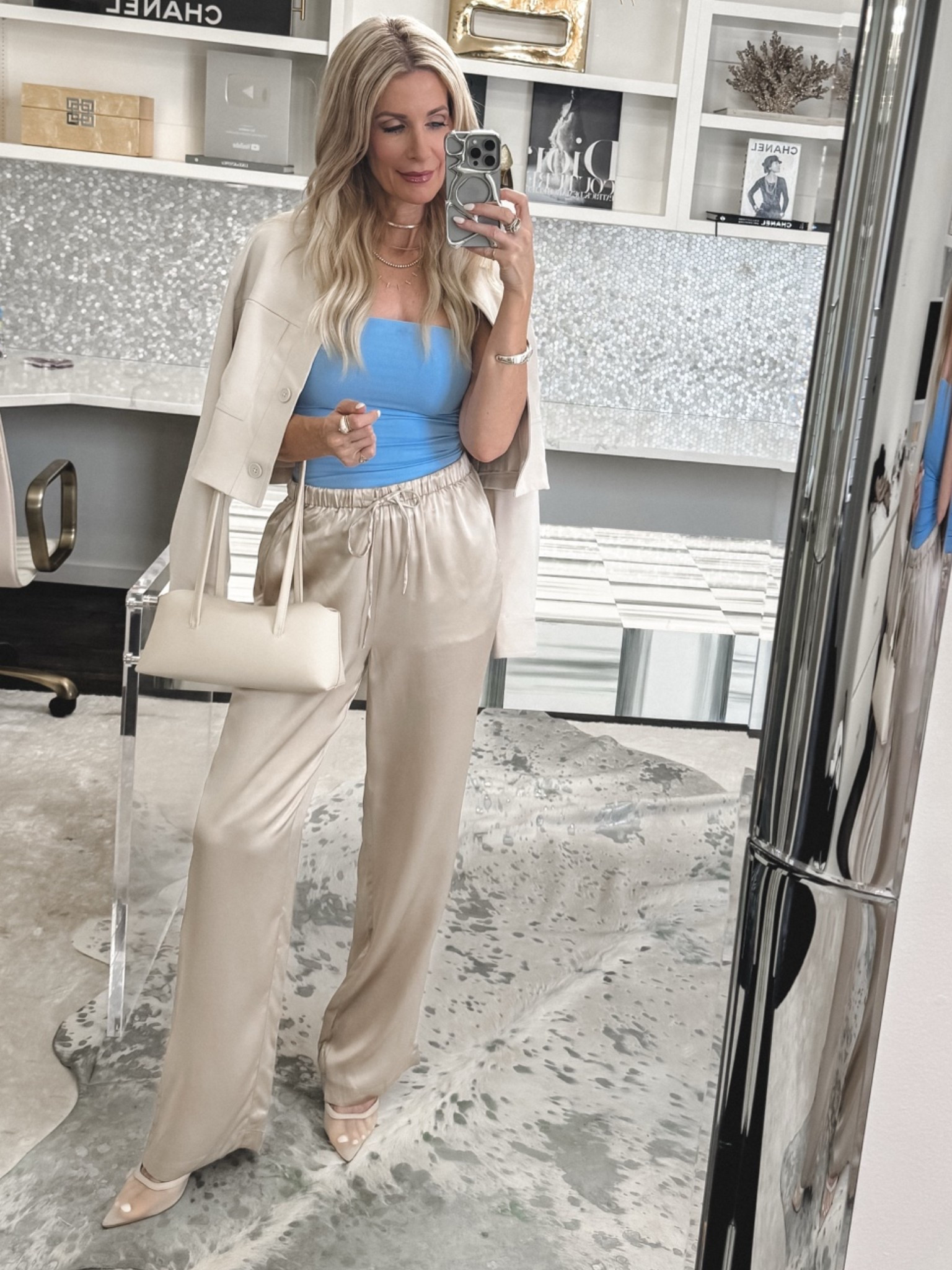 These Quince silk pants are the perfect elevated casual find—comfortable enough for everyday but chic enough for dinner or date night. I love them styled with this strapless blue top and lightweight shirt jacket for a modern summer outfit. XS in the top, jacket, and pants. #QuincePants #SummerOutfit #ChicStyle 

 

#LTKOver40 #LTKootd #LTKSeasonal #LTKOver40