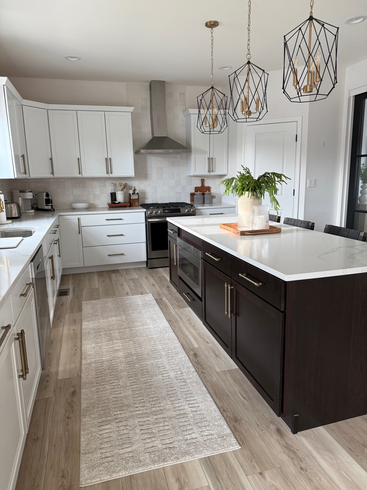 Kitchen decor! Runner and cabinet pulls are from Amazon! Kitchen pendants and backsplash tile are from Wayfair. 

Kitchen runner is the 8x2-7 size 


#LTKHome