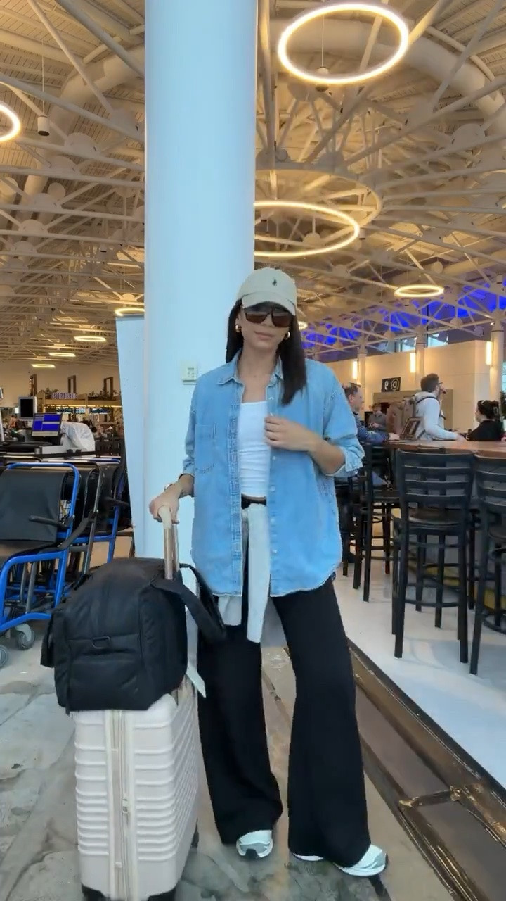 Airport outfit! The comfiest pants ever and the softest denim shirt make for a super cute and practical travel outfit ✈️ Use code NENAXSPANX for 15% off the pants - they are my most worn travel pants of all time! Size S Tall pants, S denim shirt, S tank, M sweater (sized up for oversized fit)

#LTKTravel #LTKmomlife