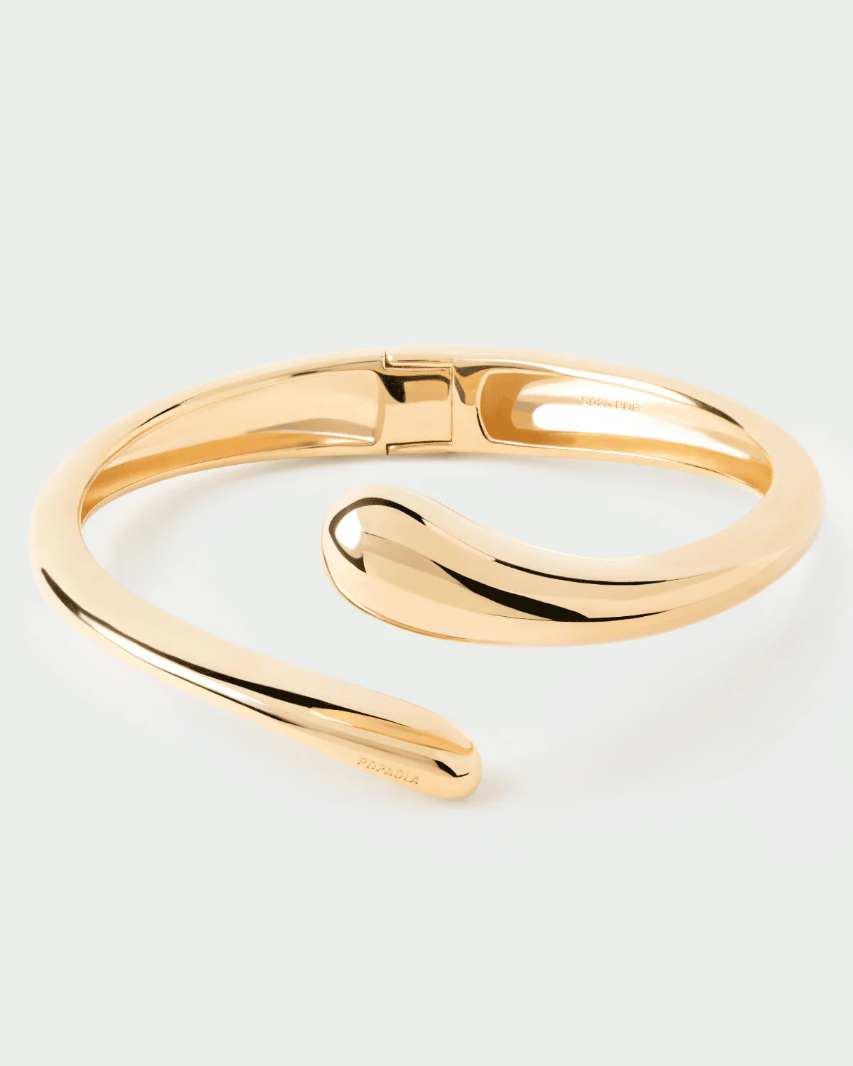 Gold-plated open bangle bracelet with a sculptural drop design | Orbit bangle bracelet | PDPAOLA | PDPAOLA DE
