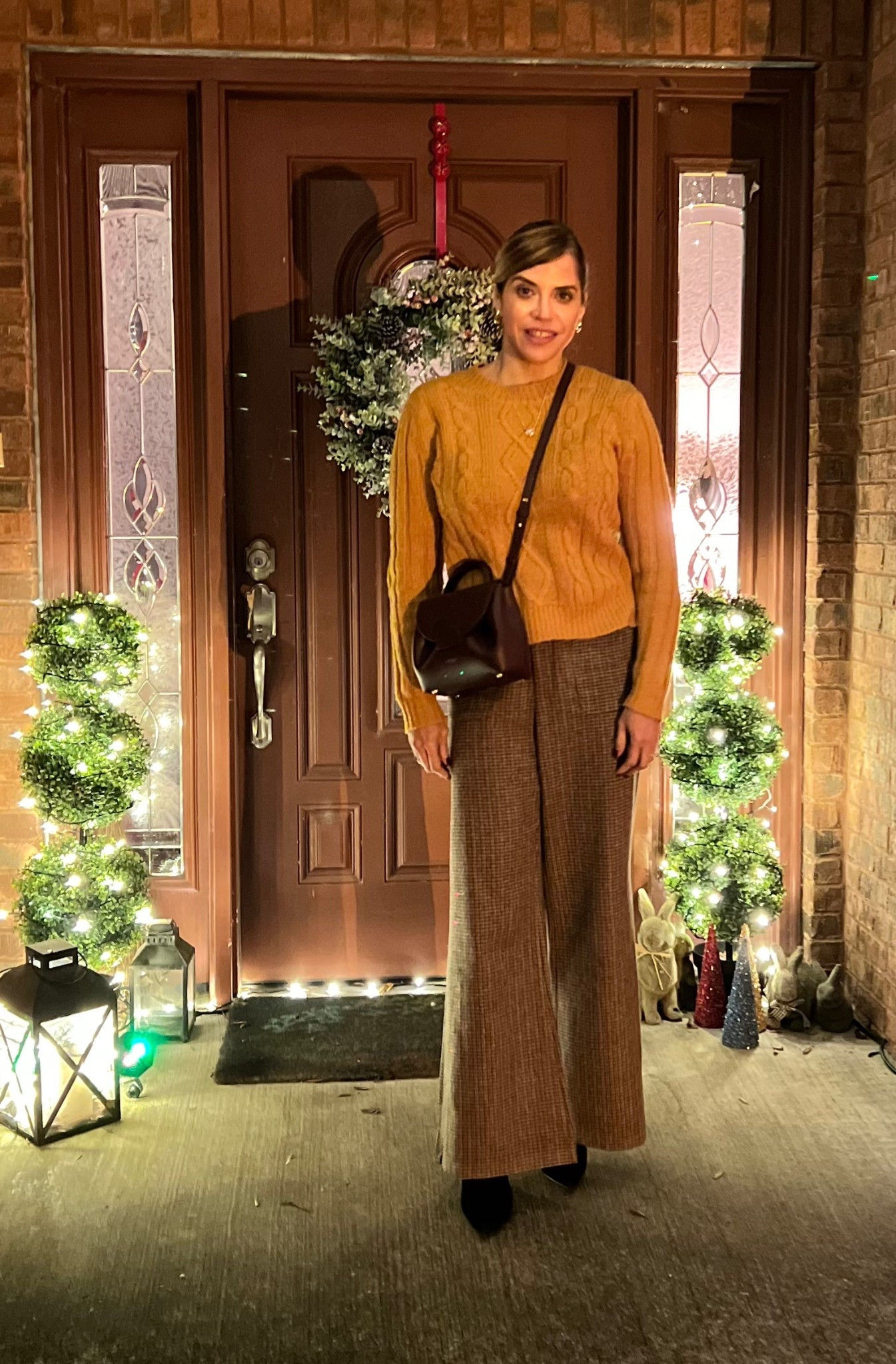 ✨🍂 **Cozy-chic but make it holiday ready** 🍂✨
Stepping into the season in my favorite kind of outfit — the perfect blend of warm textures, rich tones, and that effortlessly polished vibe we all love this time of year.

This mustard cable-knit sweater + tailored wide-leg trouser combo is giving *classic winter elegance* with a touch of “I just naturally look put together.” Add a sleek crossbody and pointed boots, and suddenly you’re the best dressed on the porch… twinkle lights included. ✨

If you’re looking for an outfit formula that’s comfortable, festive, and still très chic — this is it.

#WinterStyle #ChicAndCozy #OOTDInspo #HolidayOutfitIdeas #EffortlessElegance #SweaterWeatherSeason #ClassicStyle #StyleOver30 #WideLegPants #ModernWomanStyle #HeyMsClark #CasualChic #DecemberStyle


#LTKootd #LTKdayinmylife #LTKHoliday