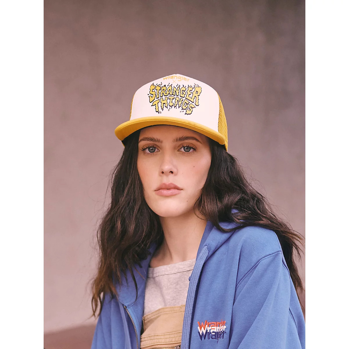 Wrangler x Stranger Things Logo Trucker Hat in Yellow | Wrangler